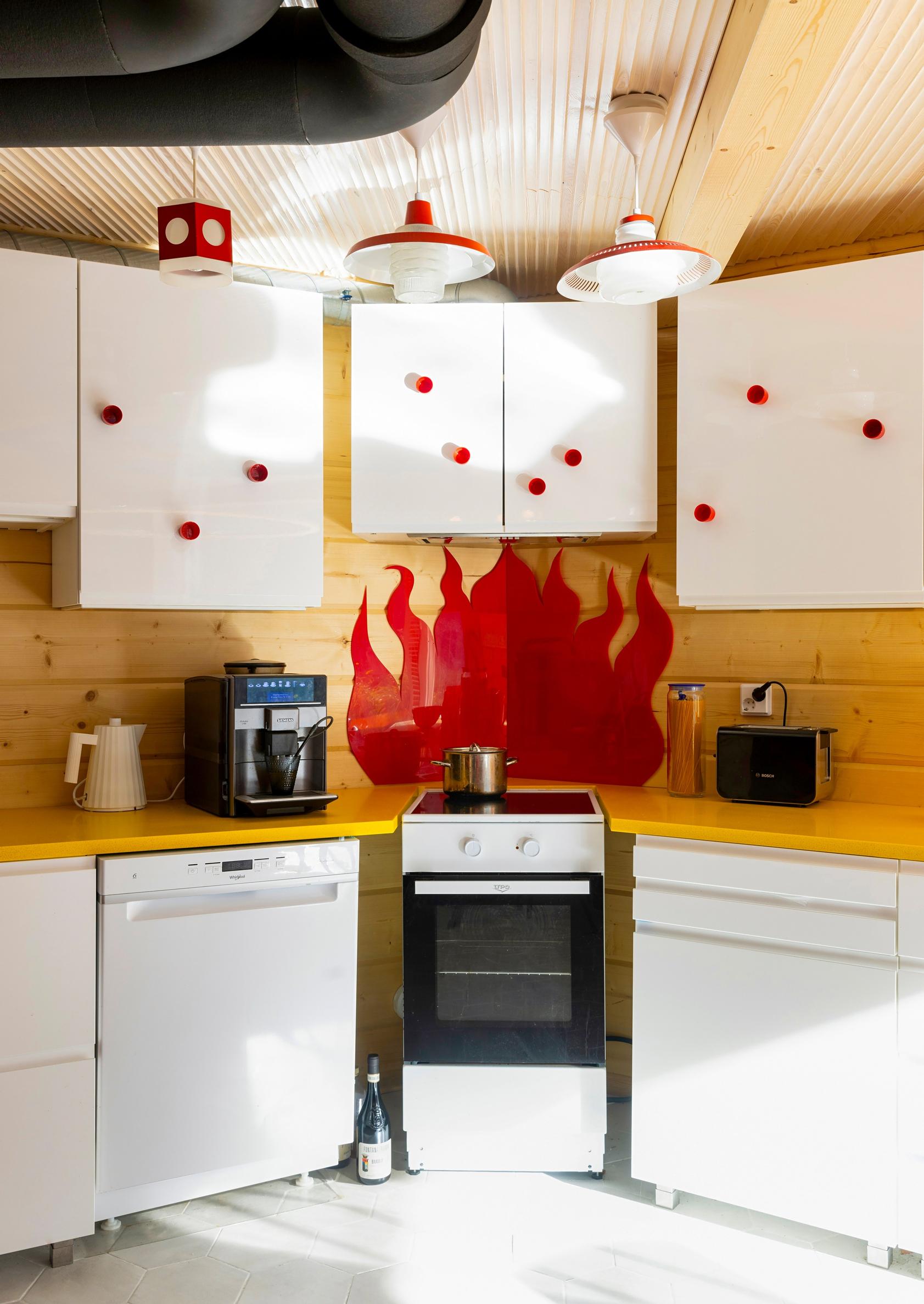 White kitchen with red details