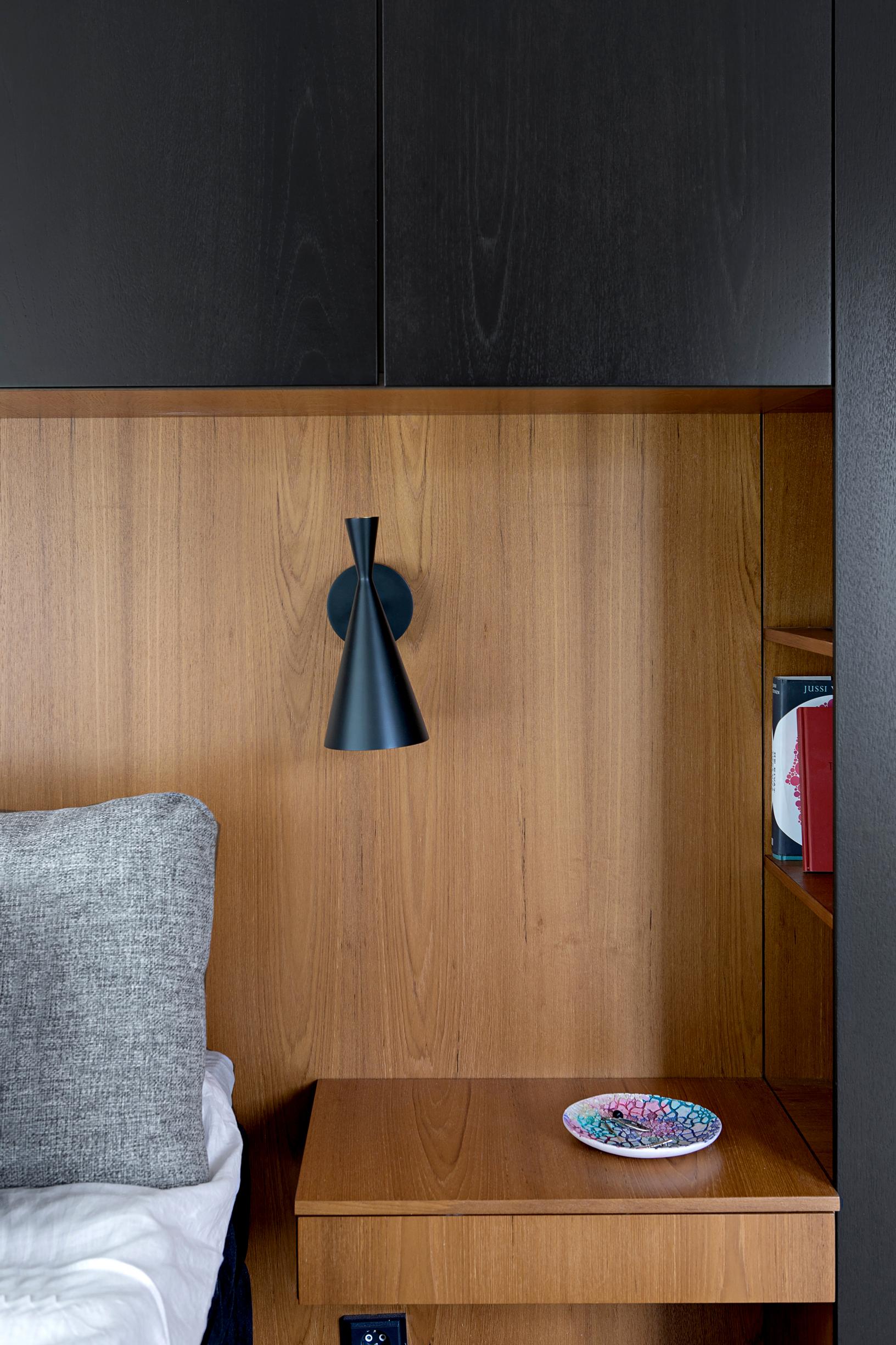Built-in cabinets above the bed