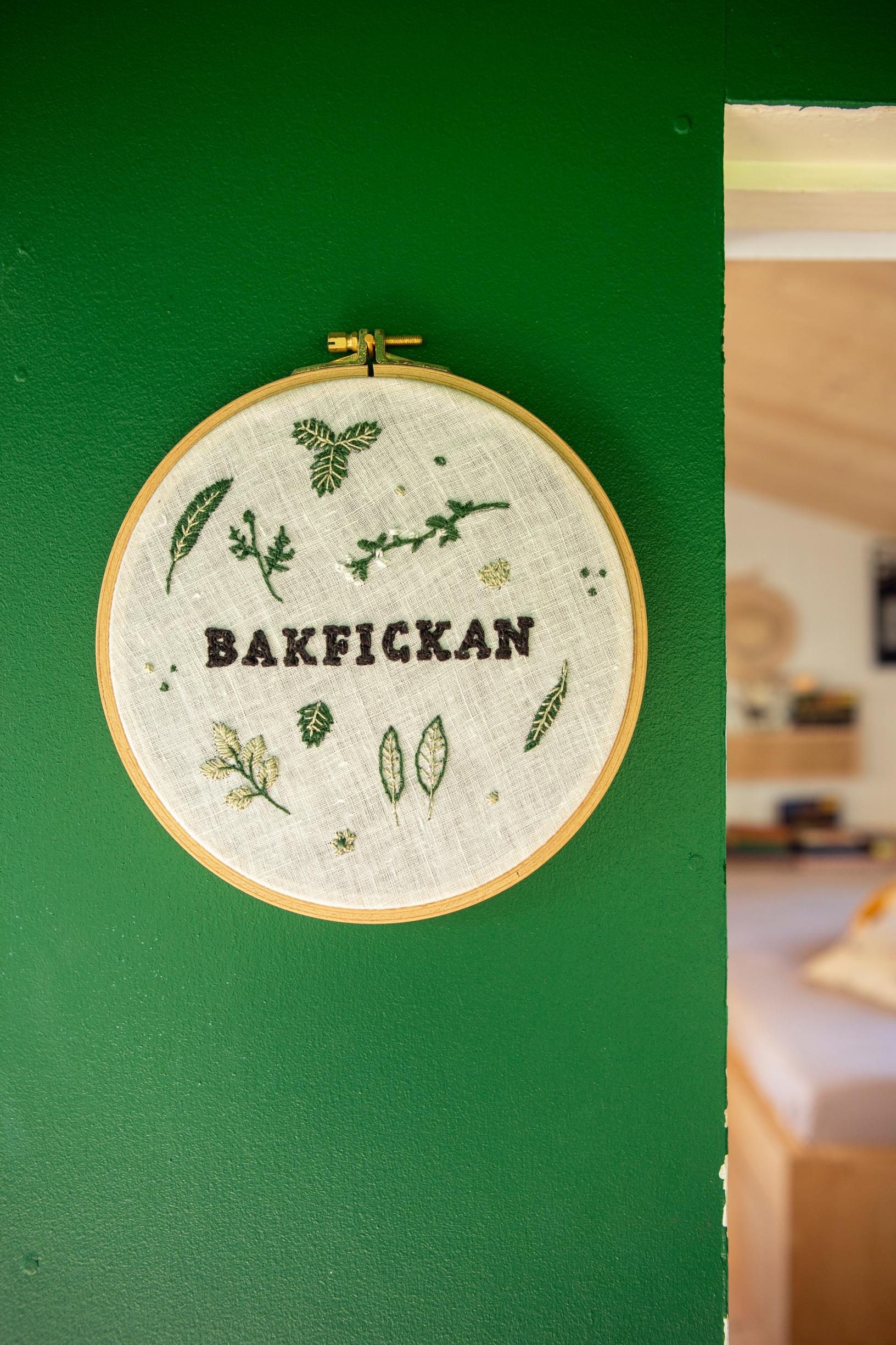 A round embroidered plaque that reads ‘Bakfickan’