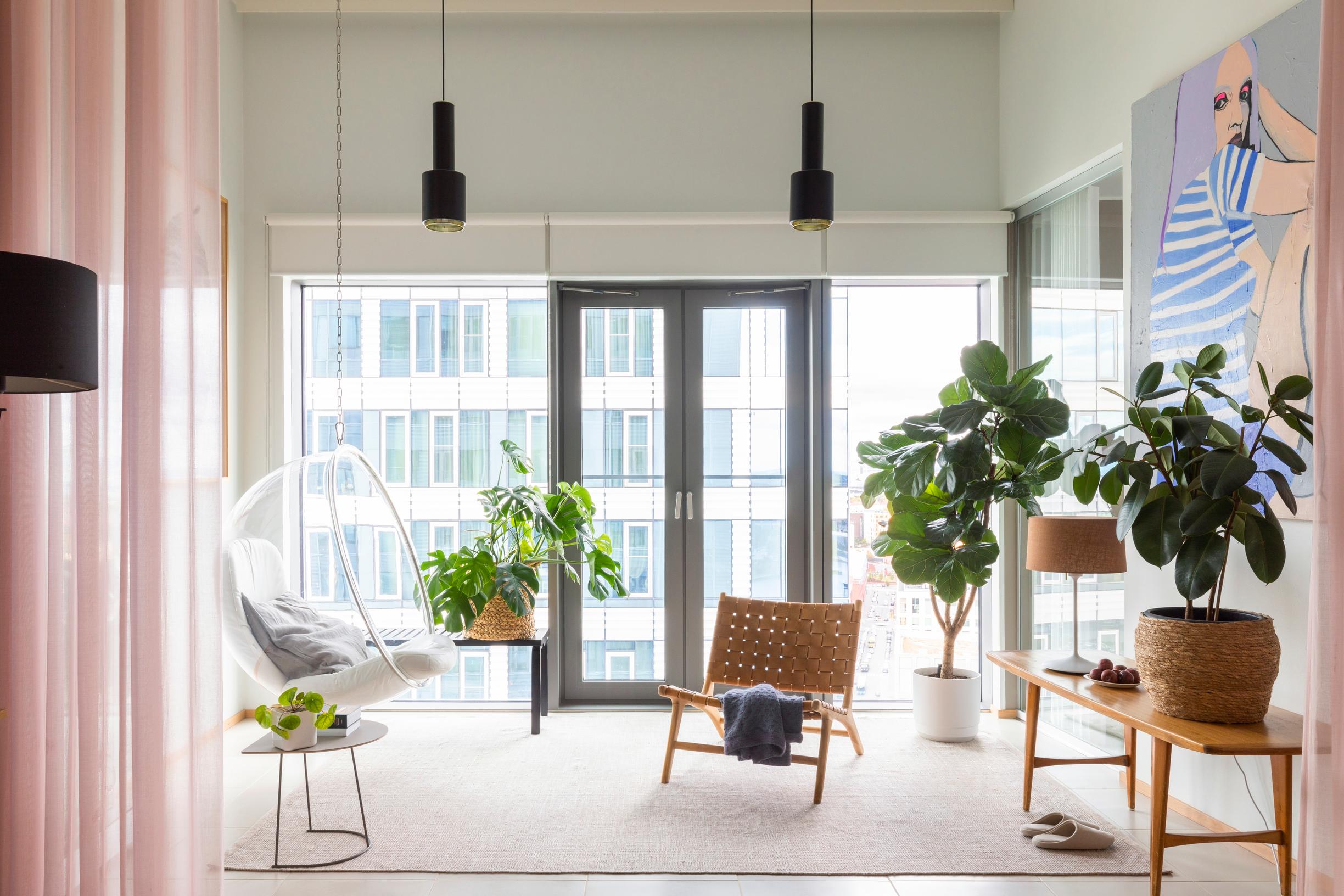 A minimalist garden room in a high-rise apartment