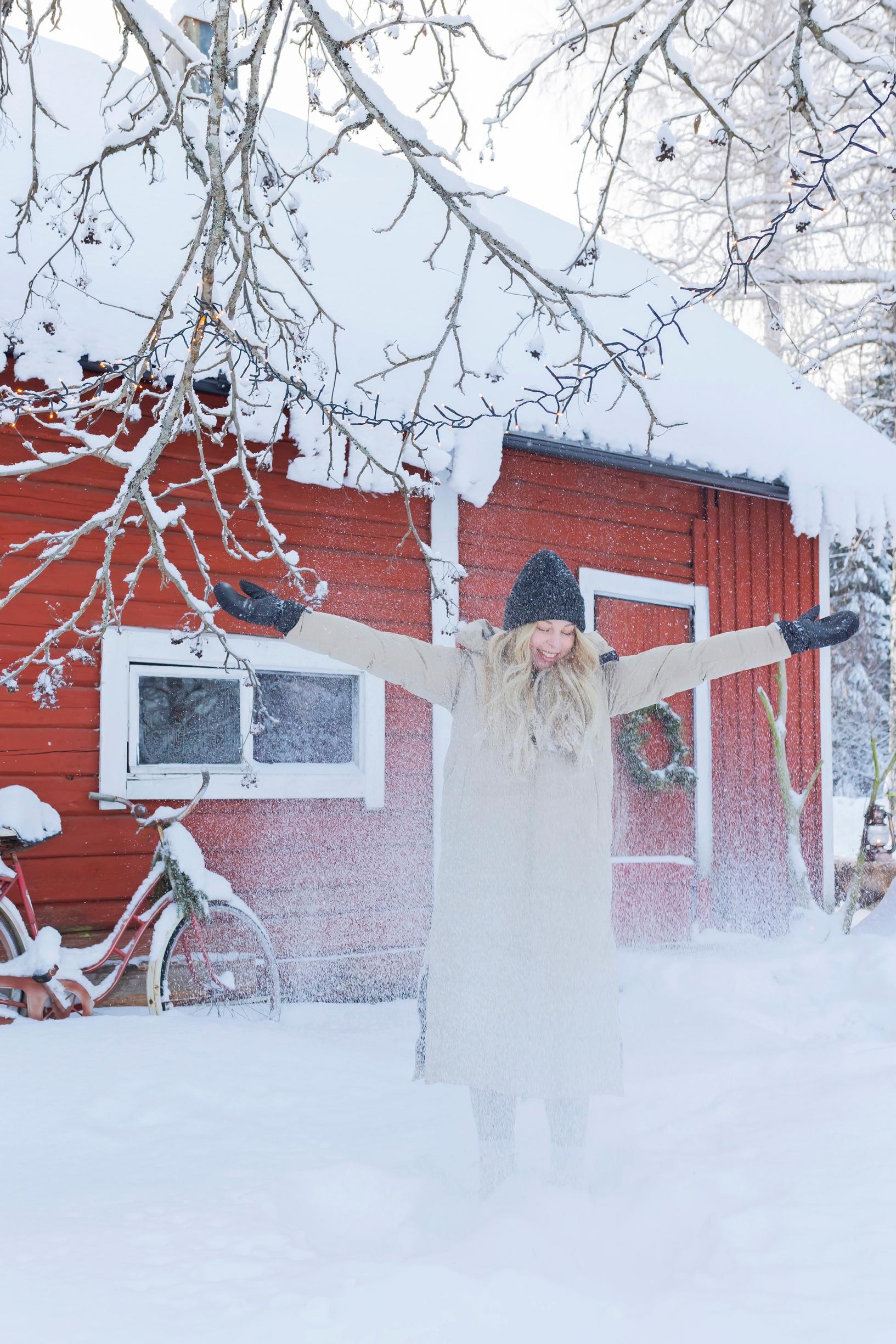 Meeri throws snow in the air