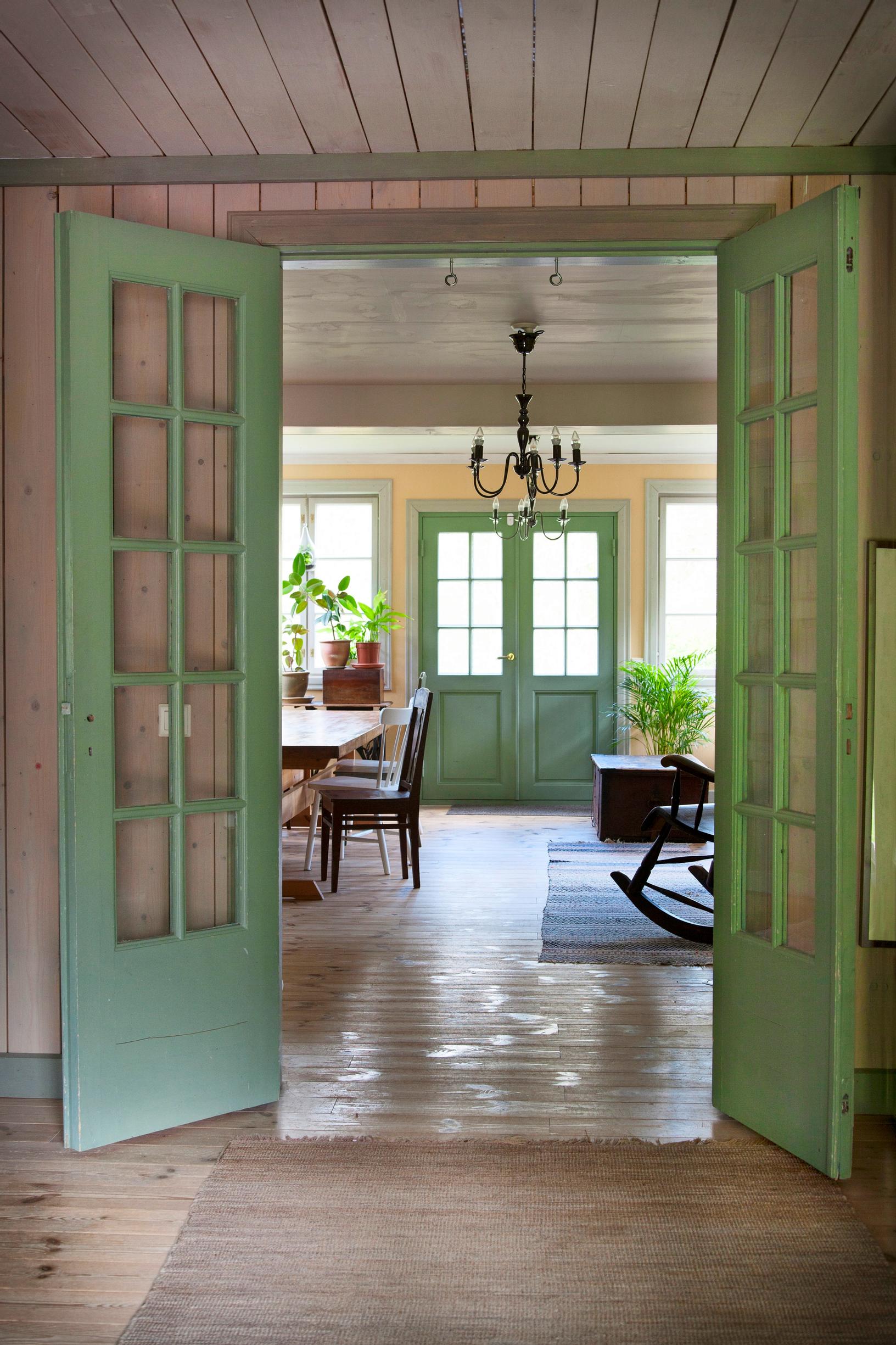 The living room's green double doors.