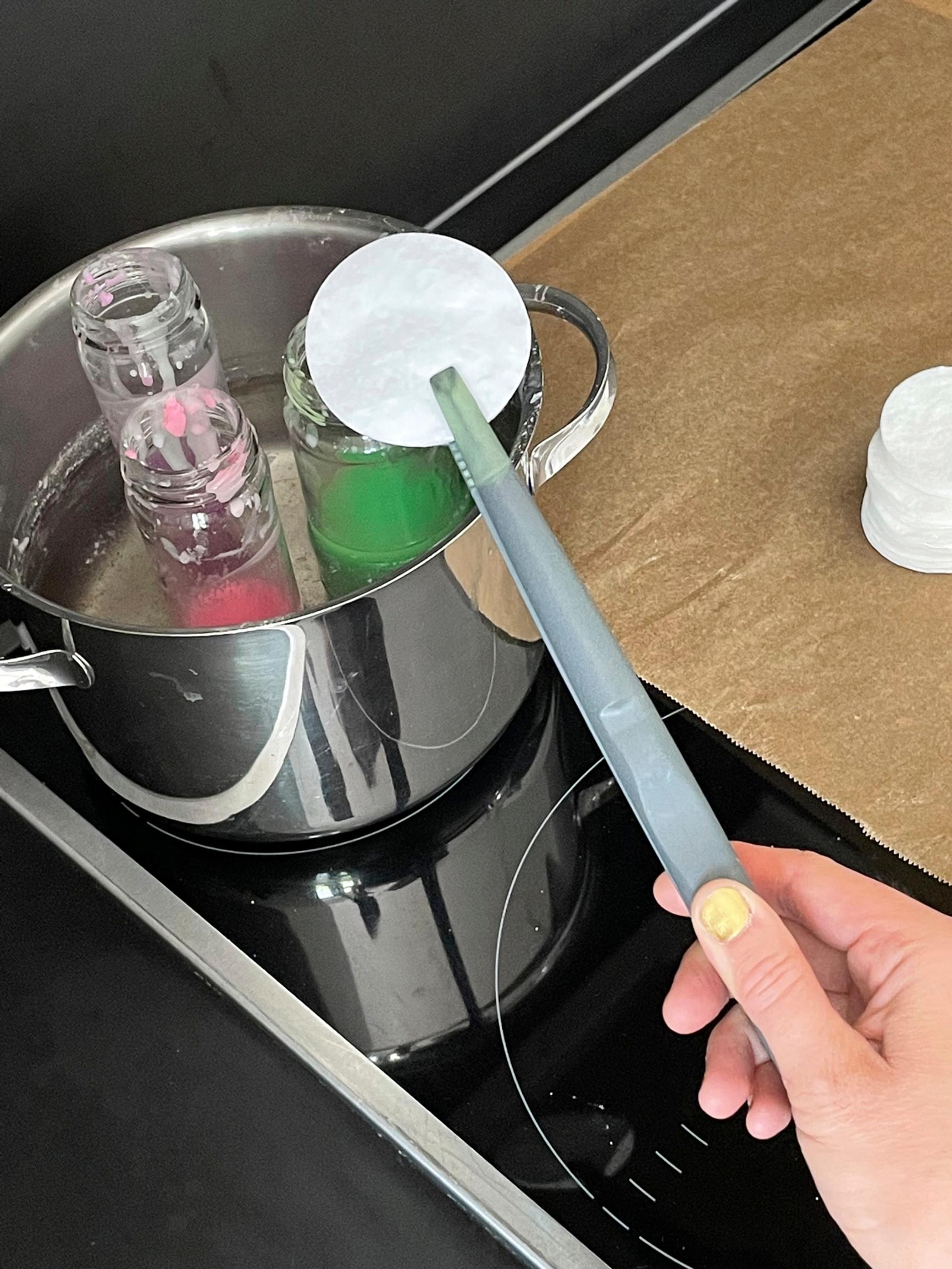 A cotton pad serves as the base for the kindling chip