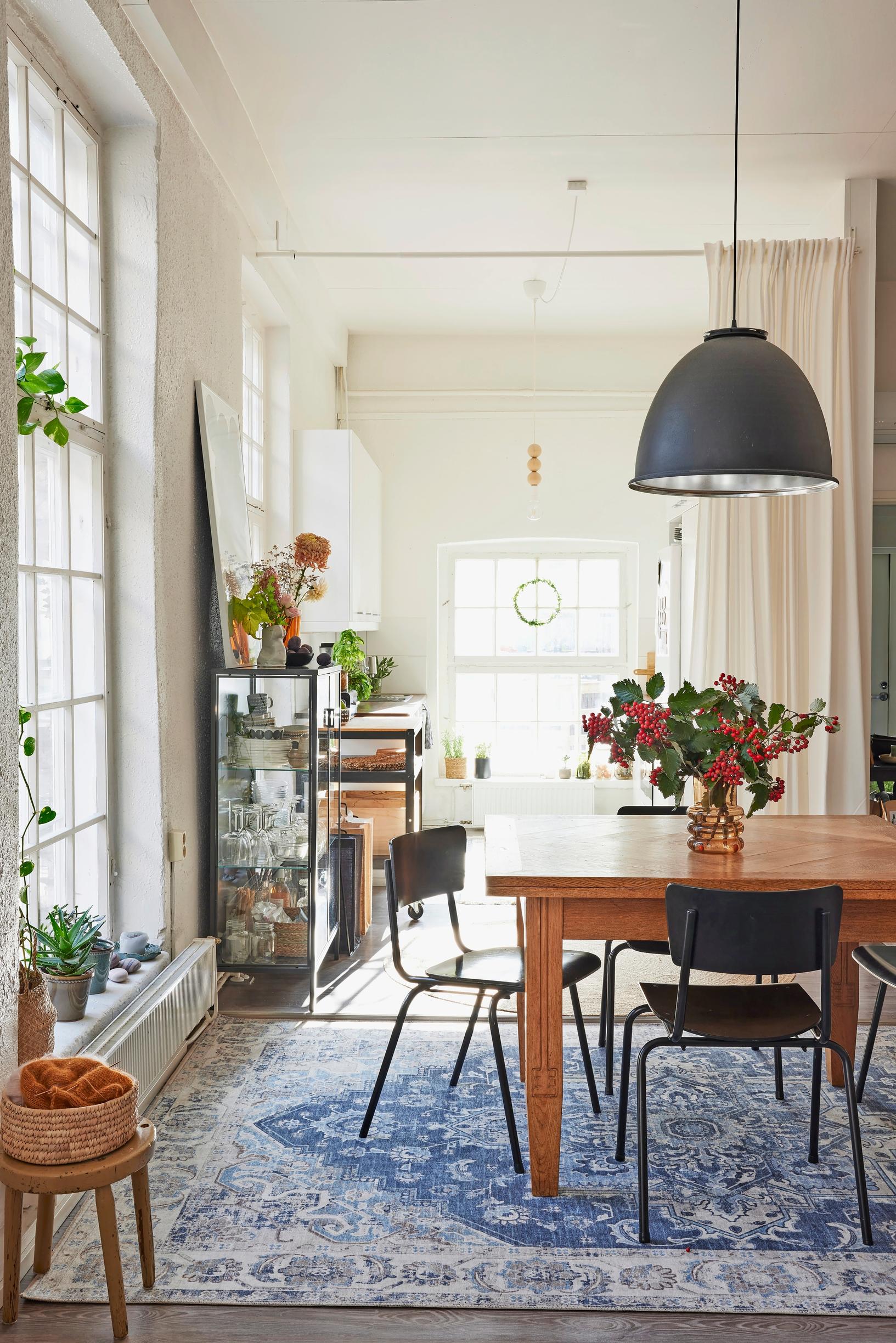 wooden table and old school chairs in the dining area