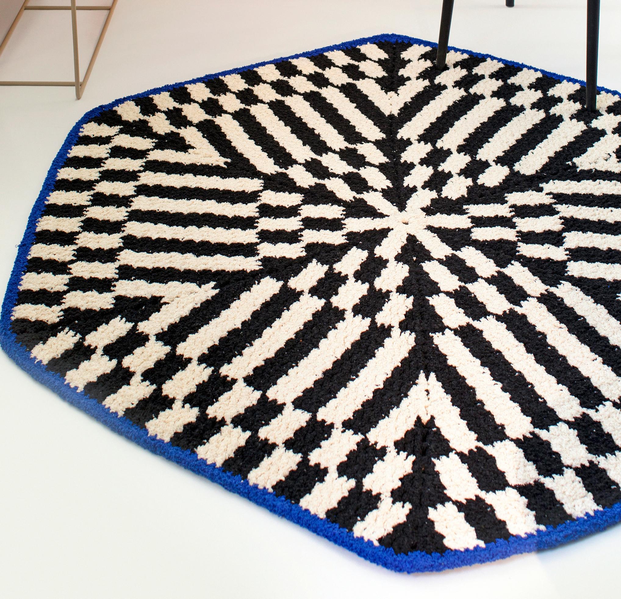 Add a bold pop to your decor with this hexagonal crocheted rug—see the pattern by Molla Mills!
