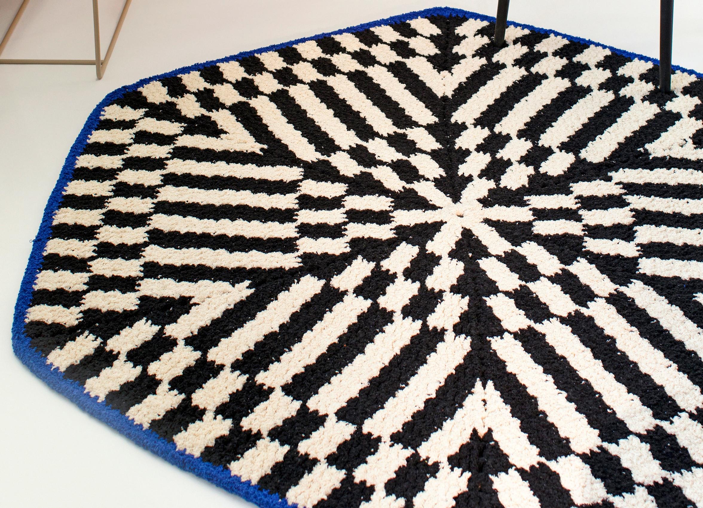 Add a bold pop to your decor with this hexagonal crocheted rug—see the pattern by Molla Mills!