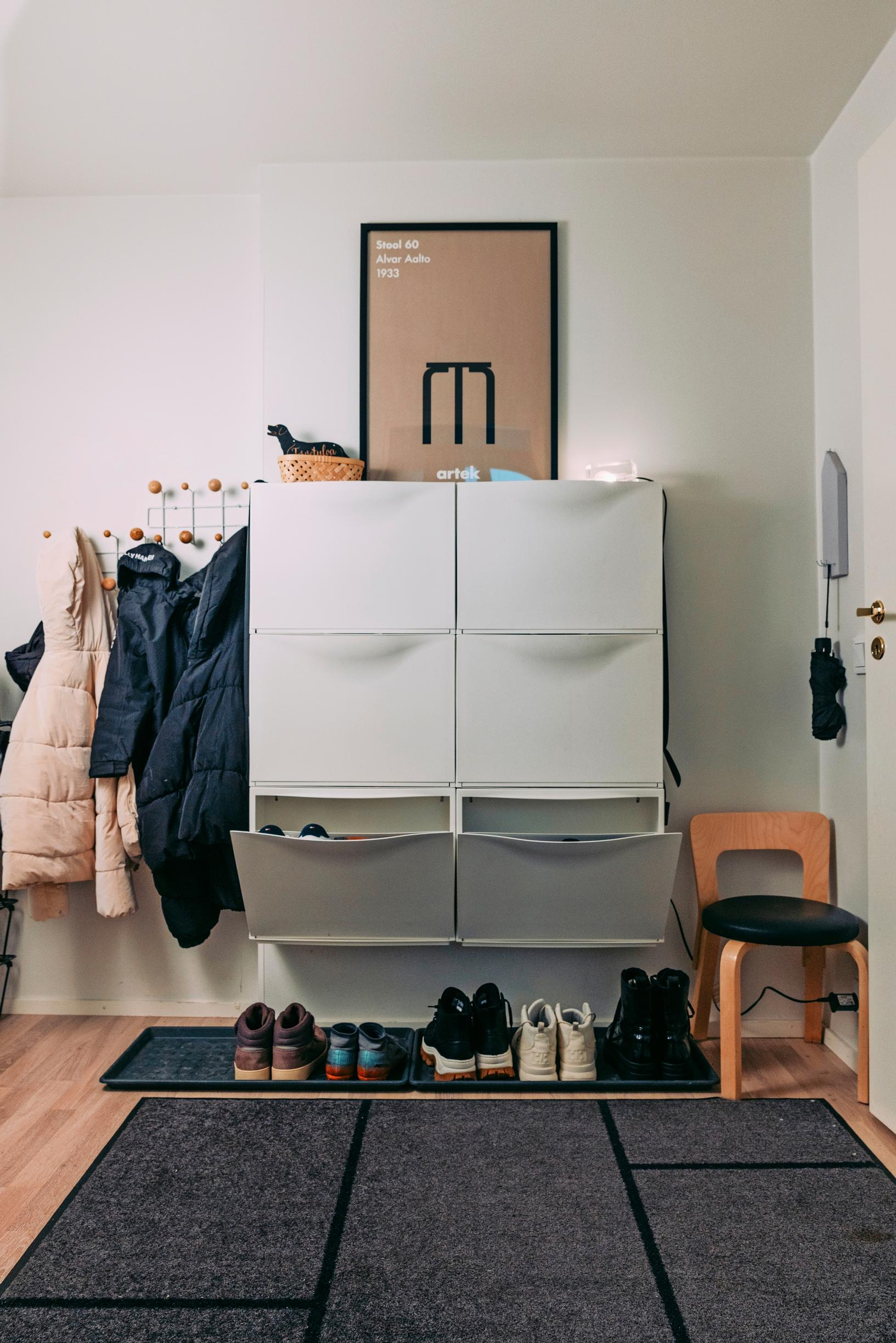 Six shoe cabinets on the wall, with space underneath for shoes.