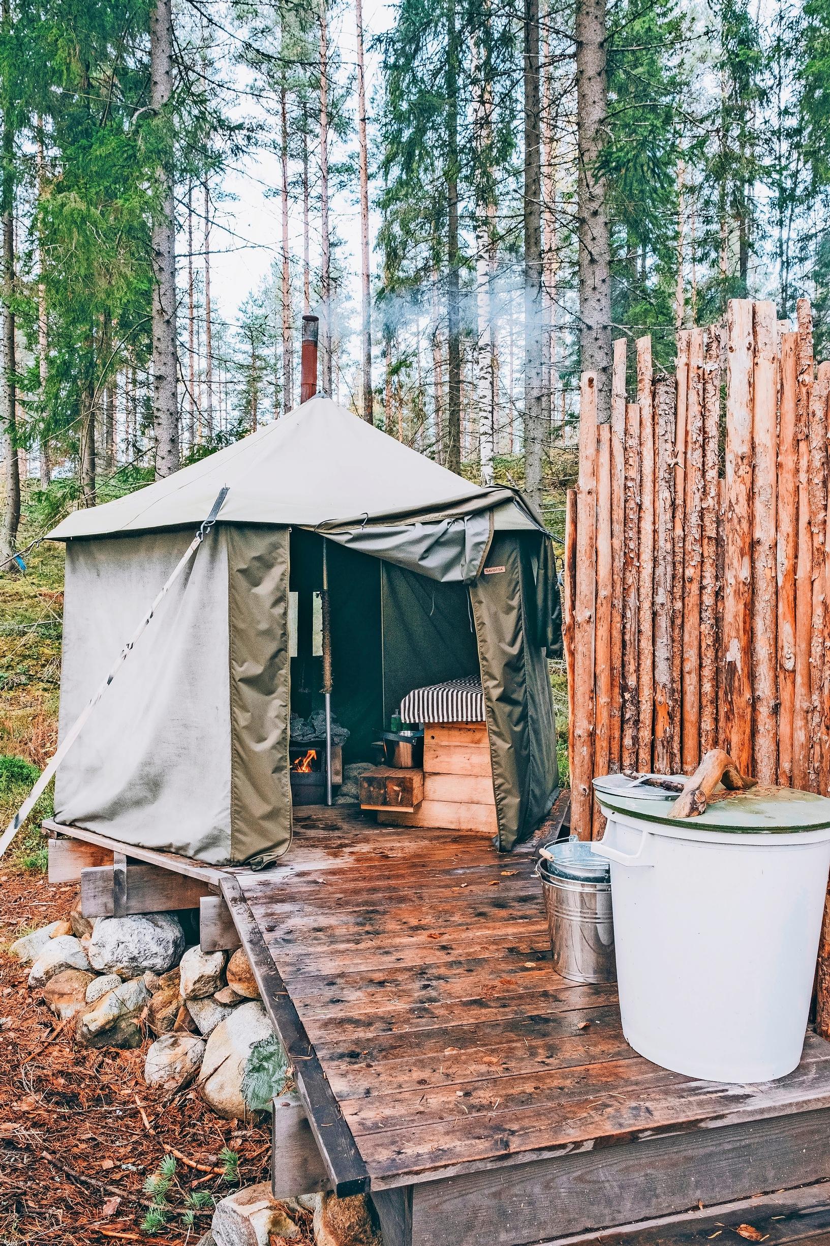 A tent sauna with terraces in a forest plot