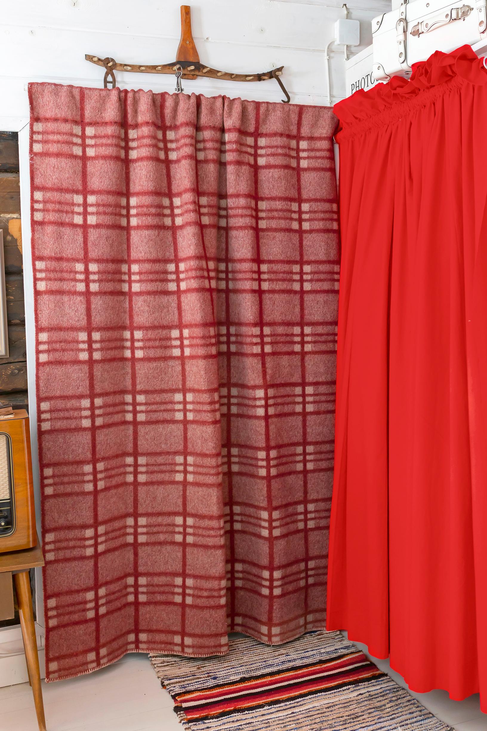 Blankets in front of the porch door.