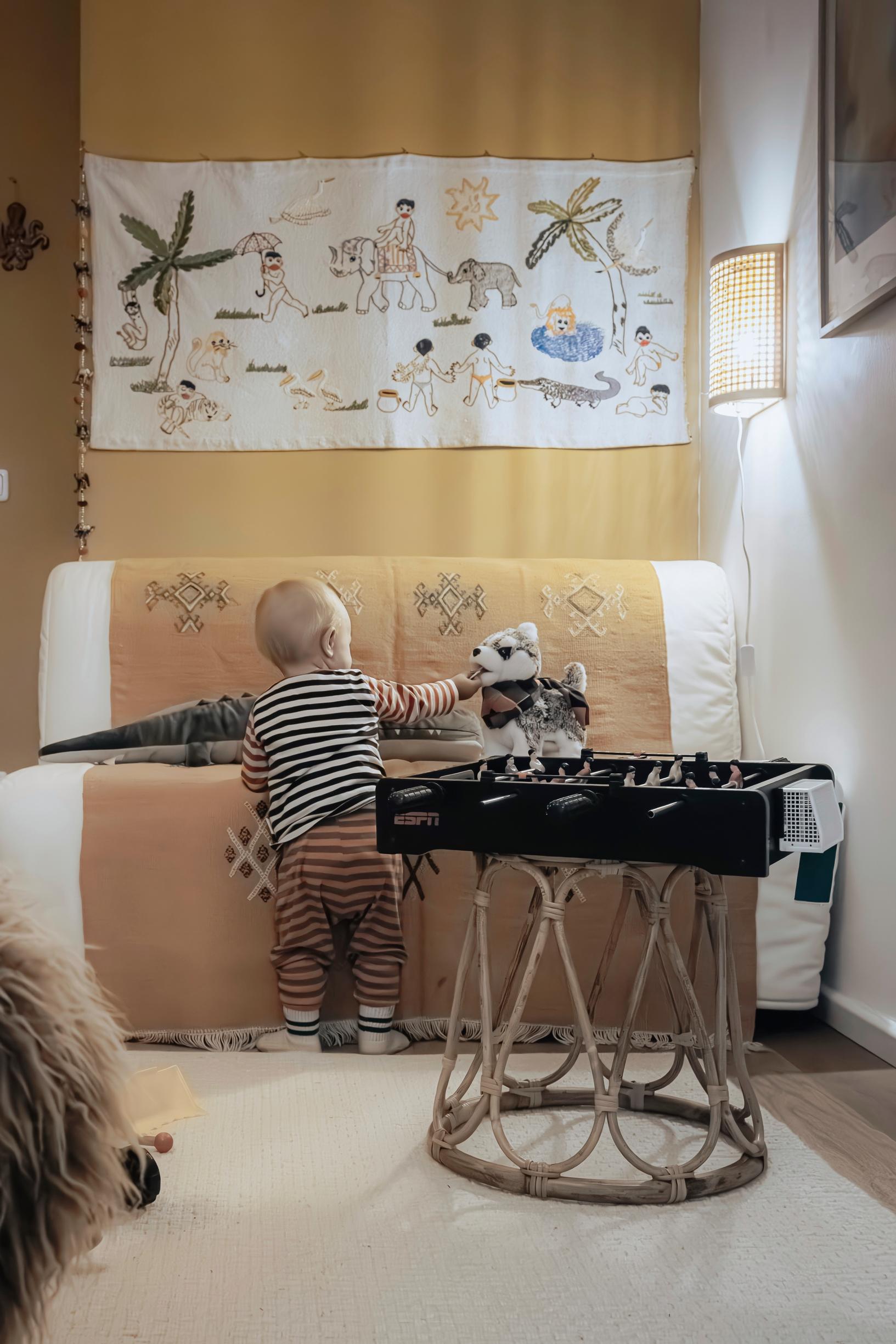 The guest room is a multipurpose area where Aimo plays.