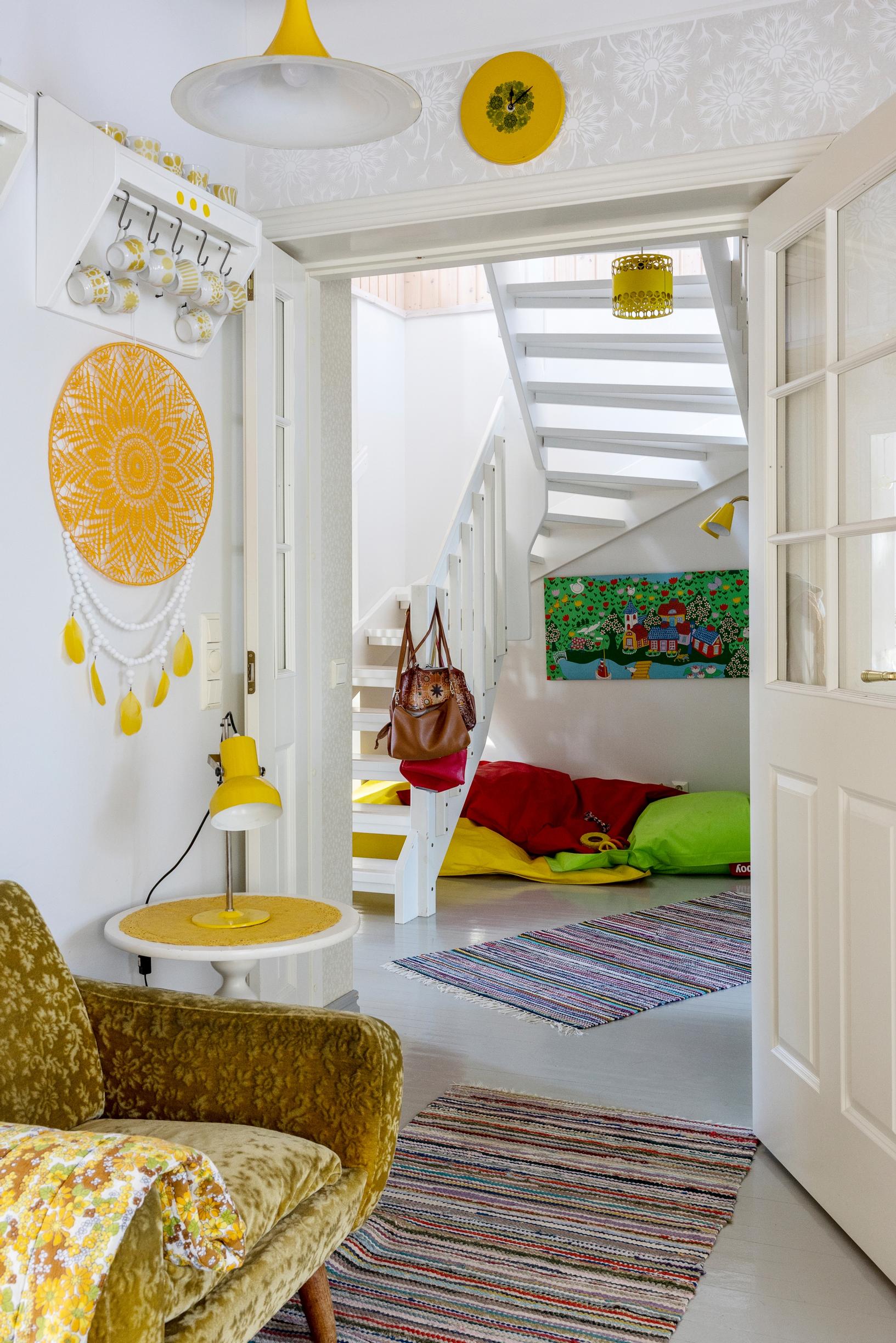 A lounge corner under the stairs.