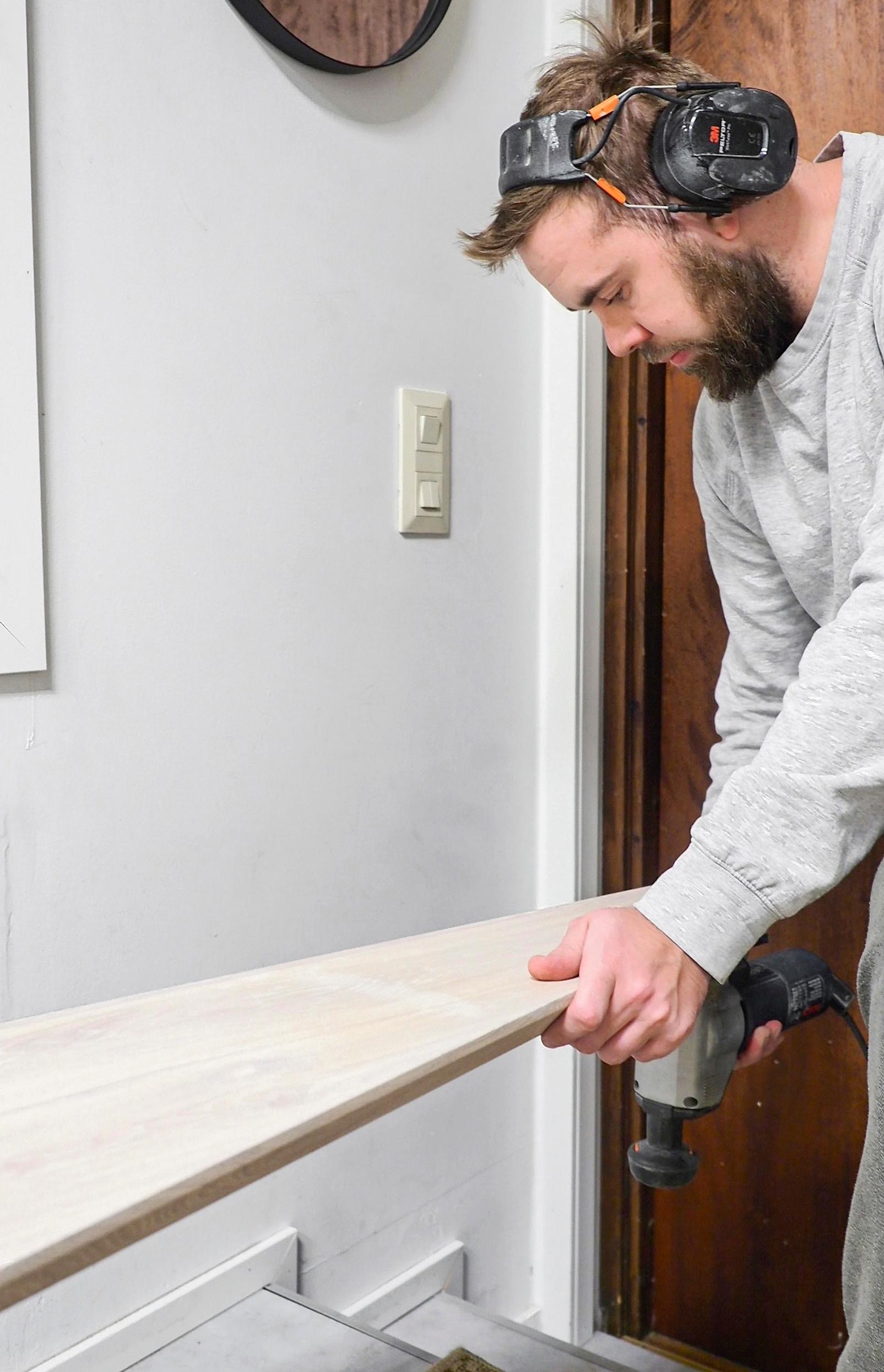 Cutting any necessary notches with a jigsaw