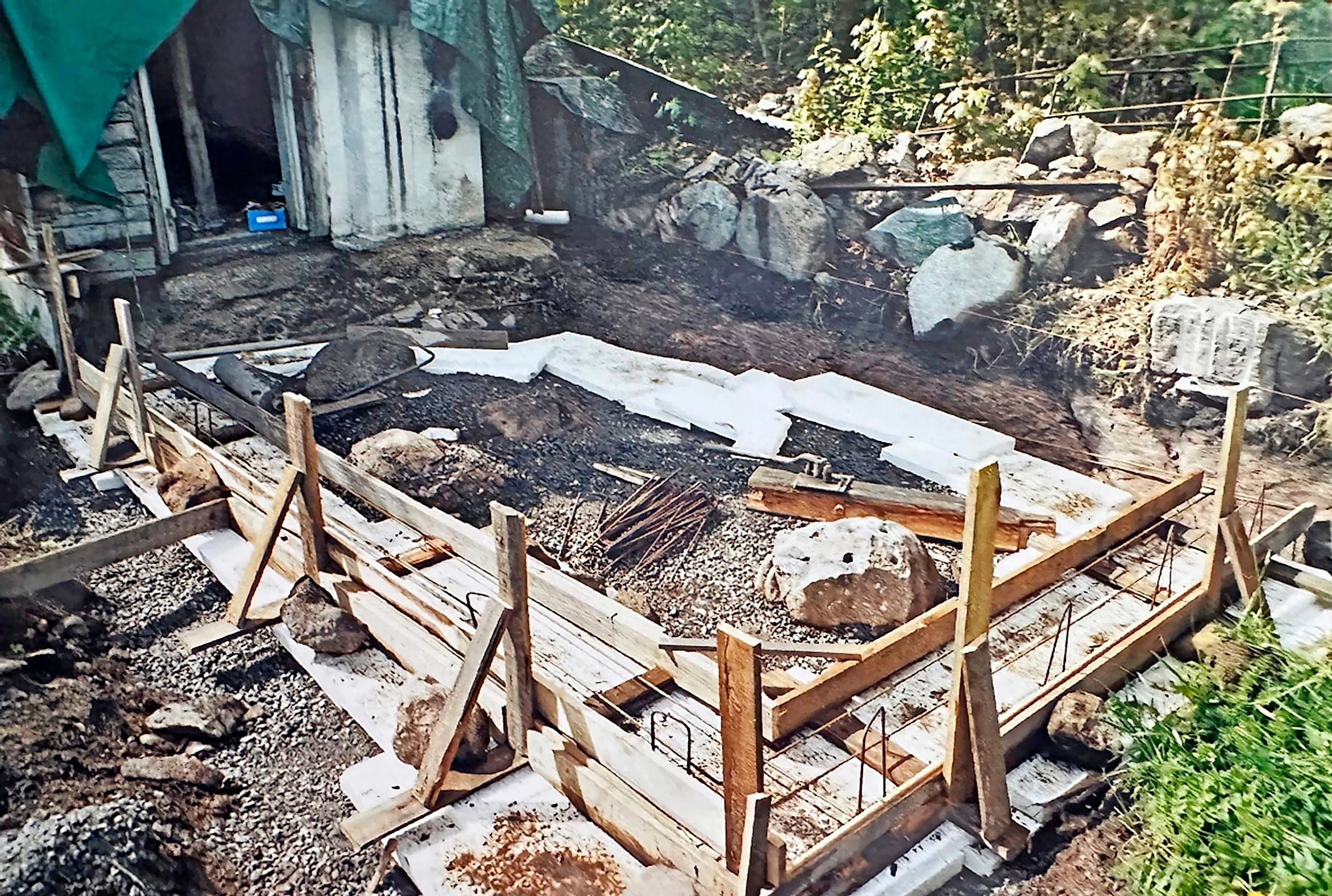 Constructing the extension of the Hole family’s old sauna chamber, wooden frame in the garden