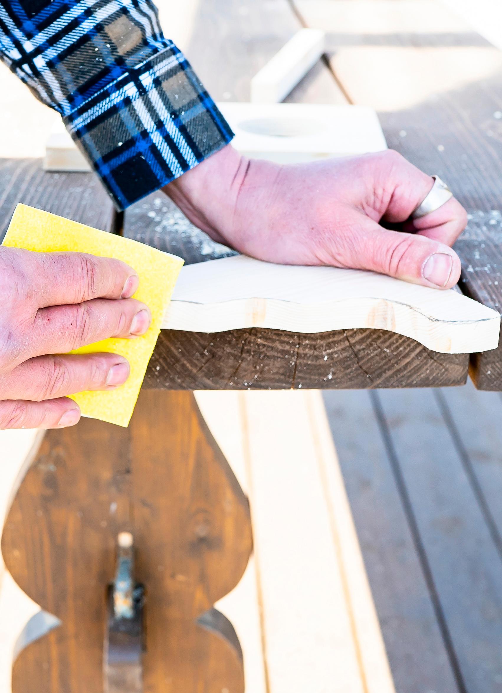 Sanding the wooden bottle holder