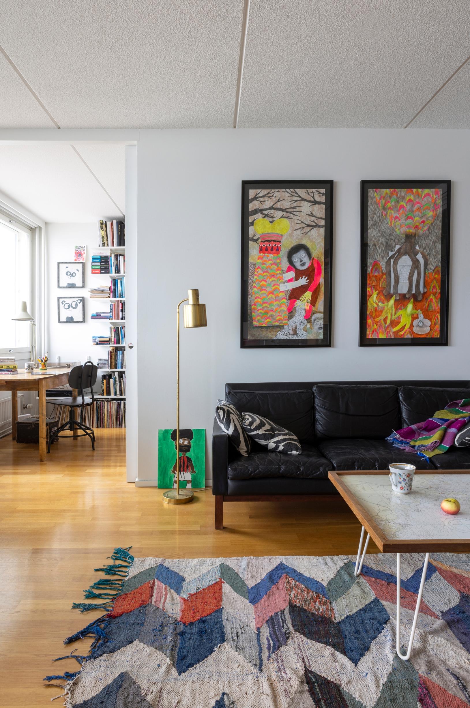 Living room with a sofa and paintings