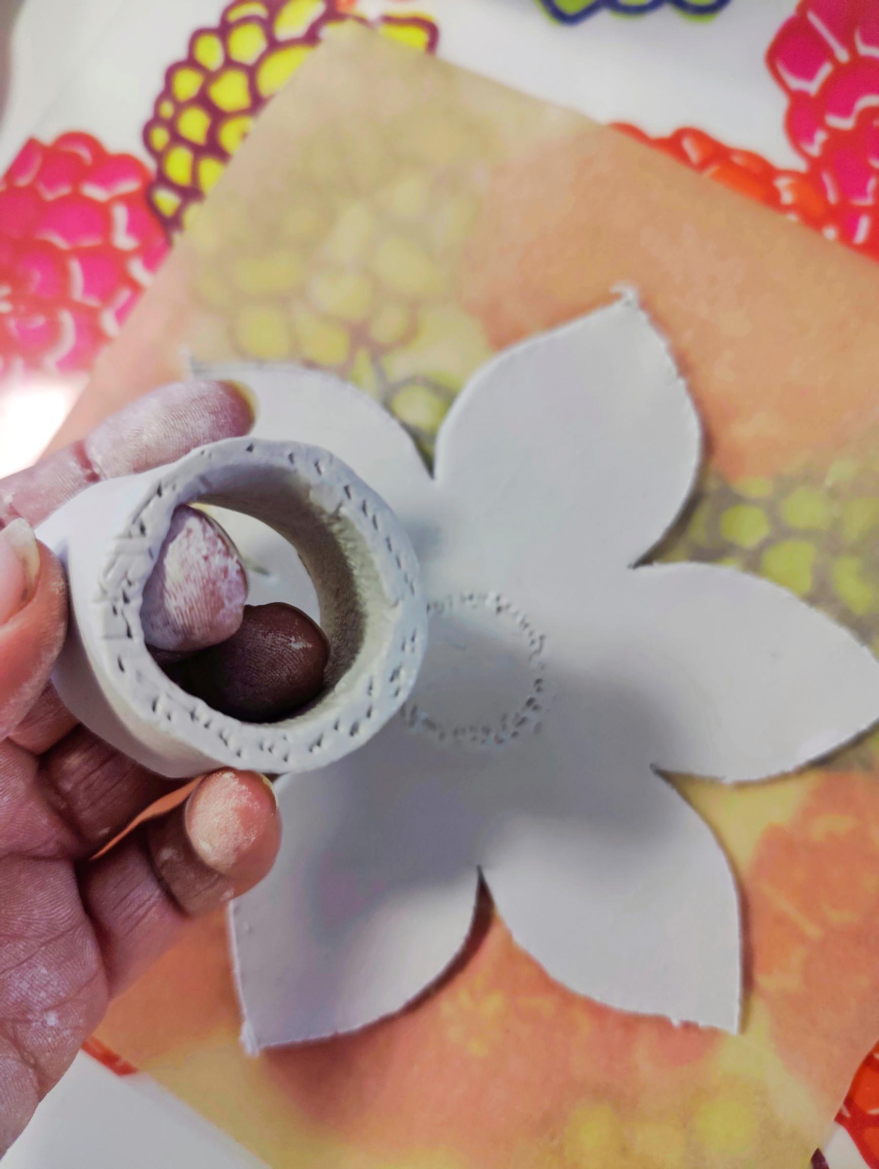 Attaching the center to the flower