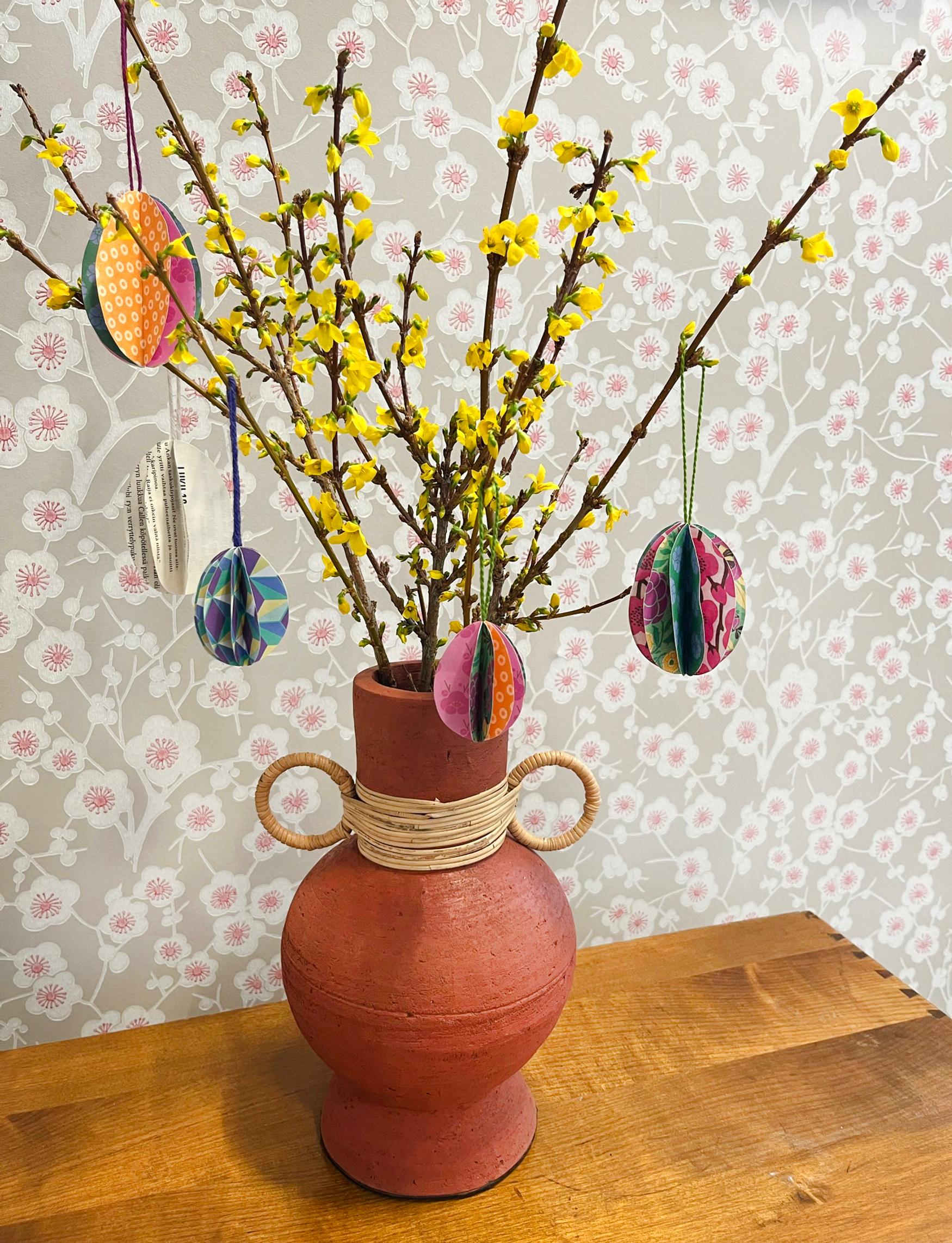 Paper Easter eggs on branches