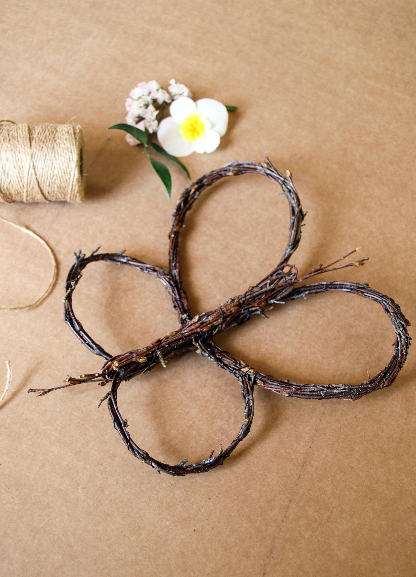Using dried flowers on twig butterflies