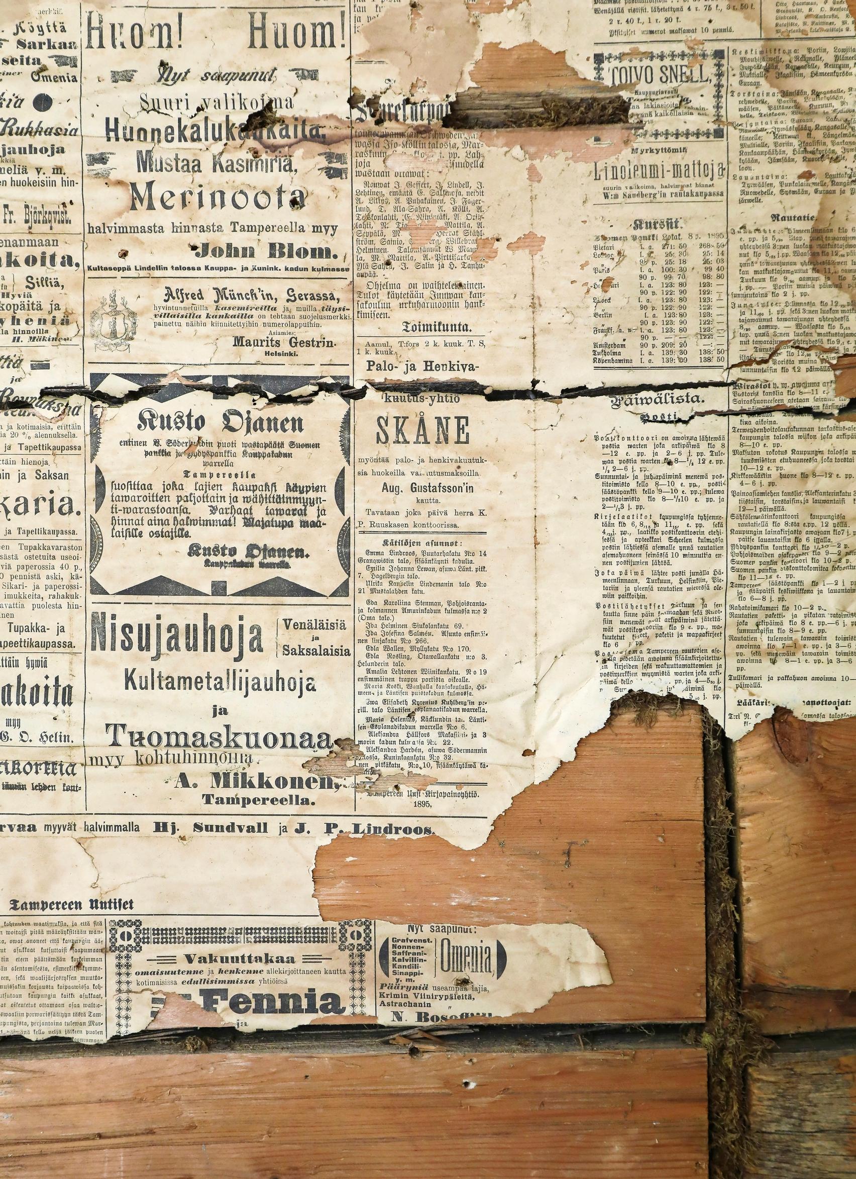 Newspaper pages discovered in the house’s structure