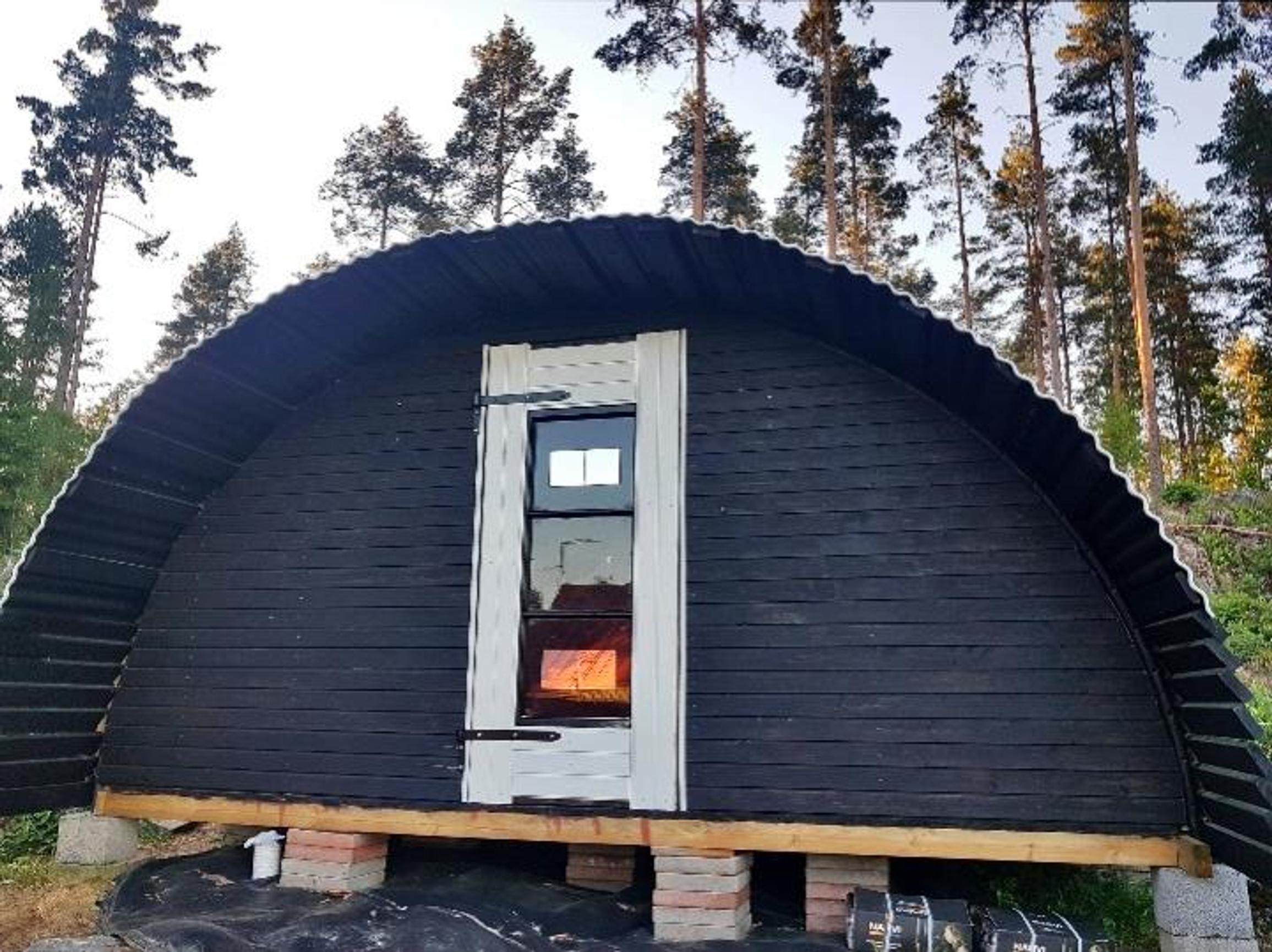 The backyard sauna made from an old trampoline during construction.