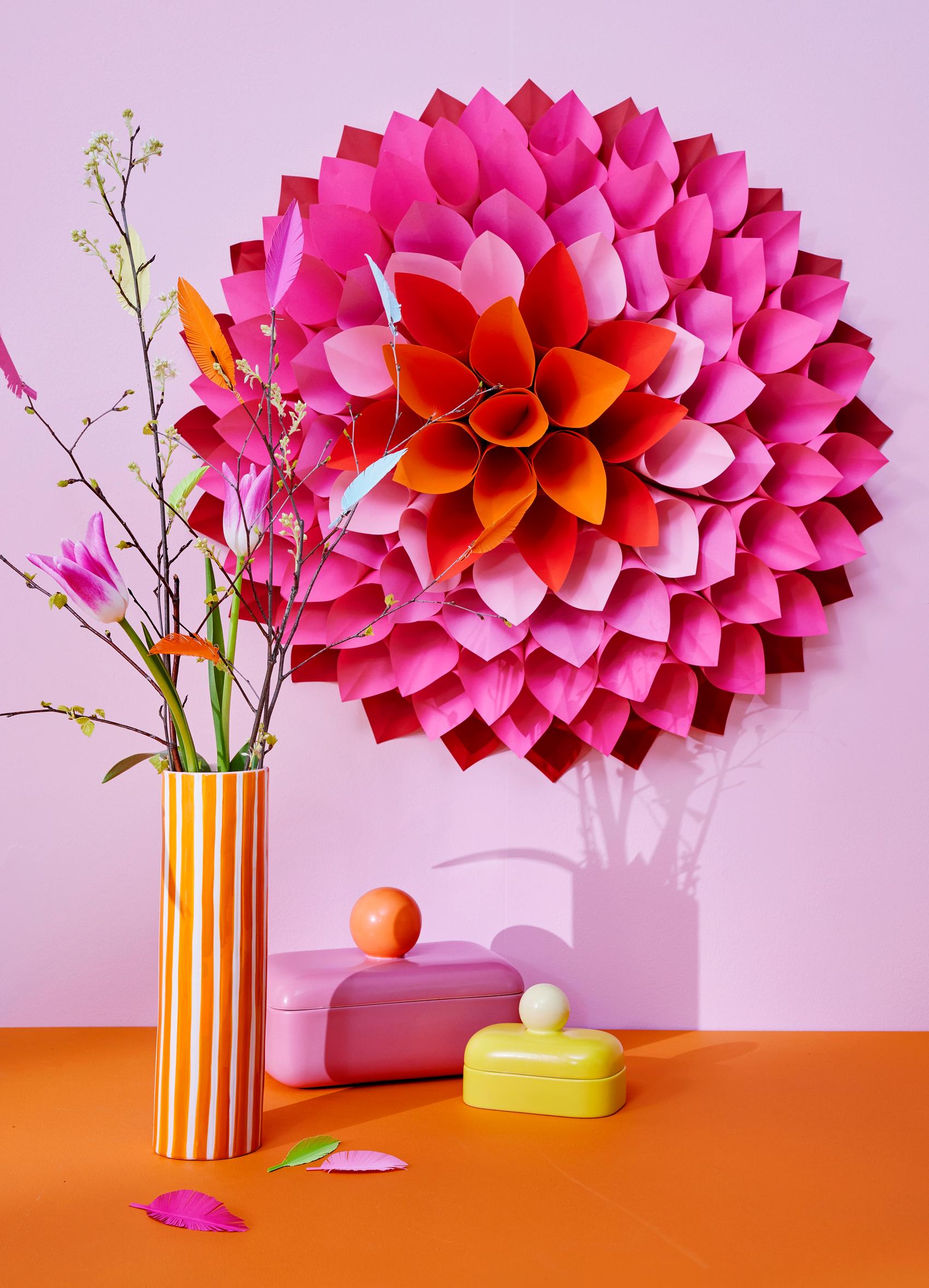 Colorful paper dahlia on the wall