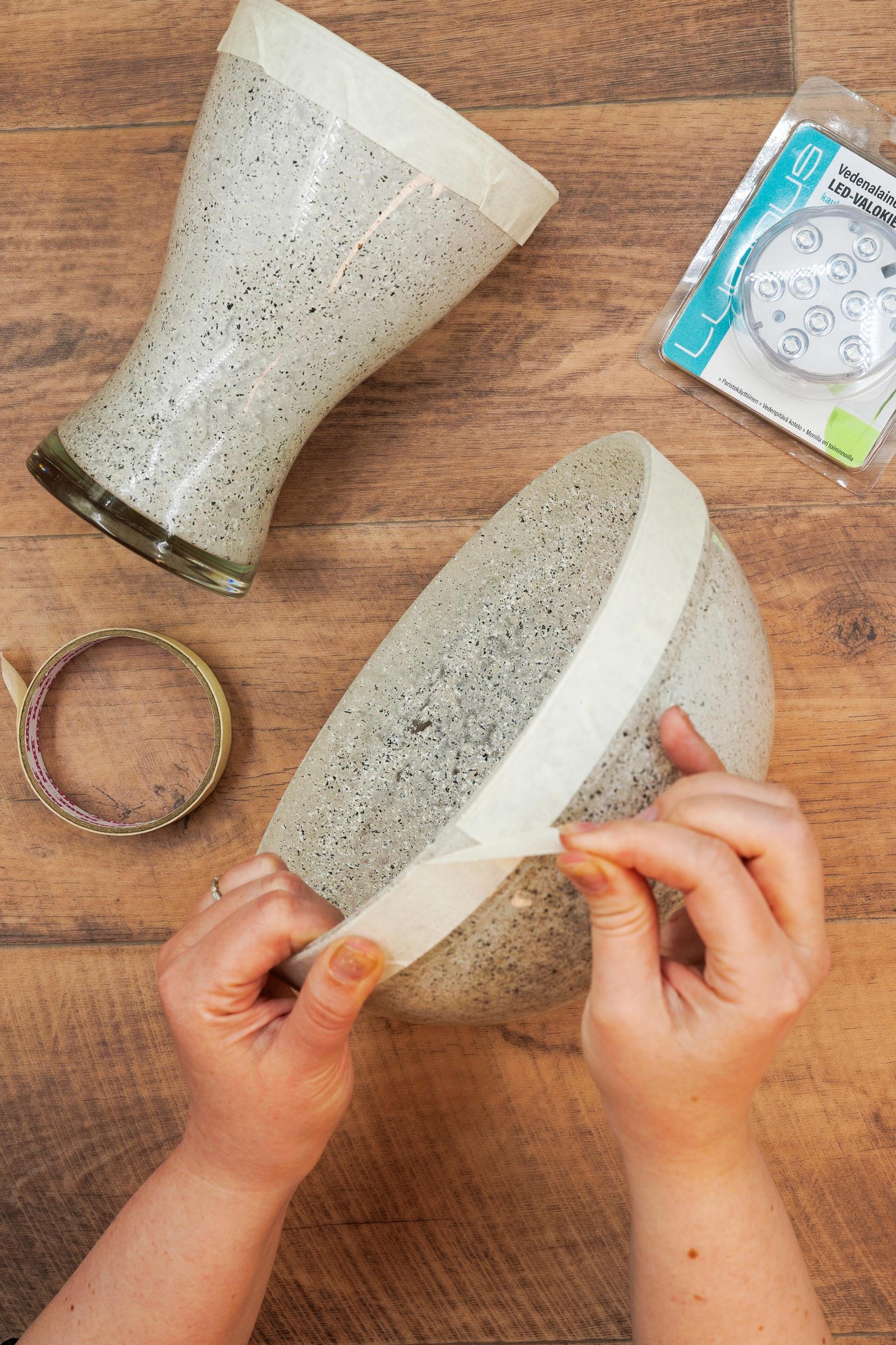 Remove the tape from the dishes once the paint has dried.