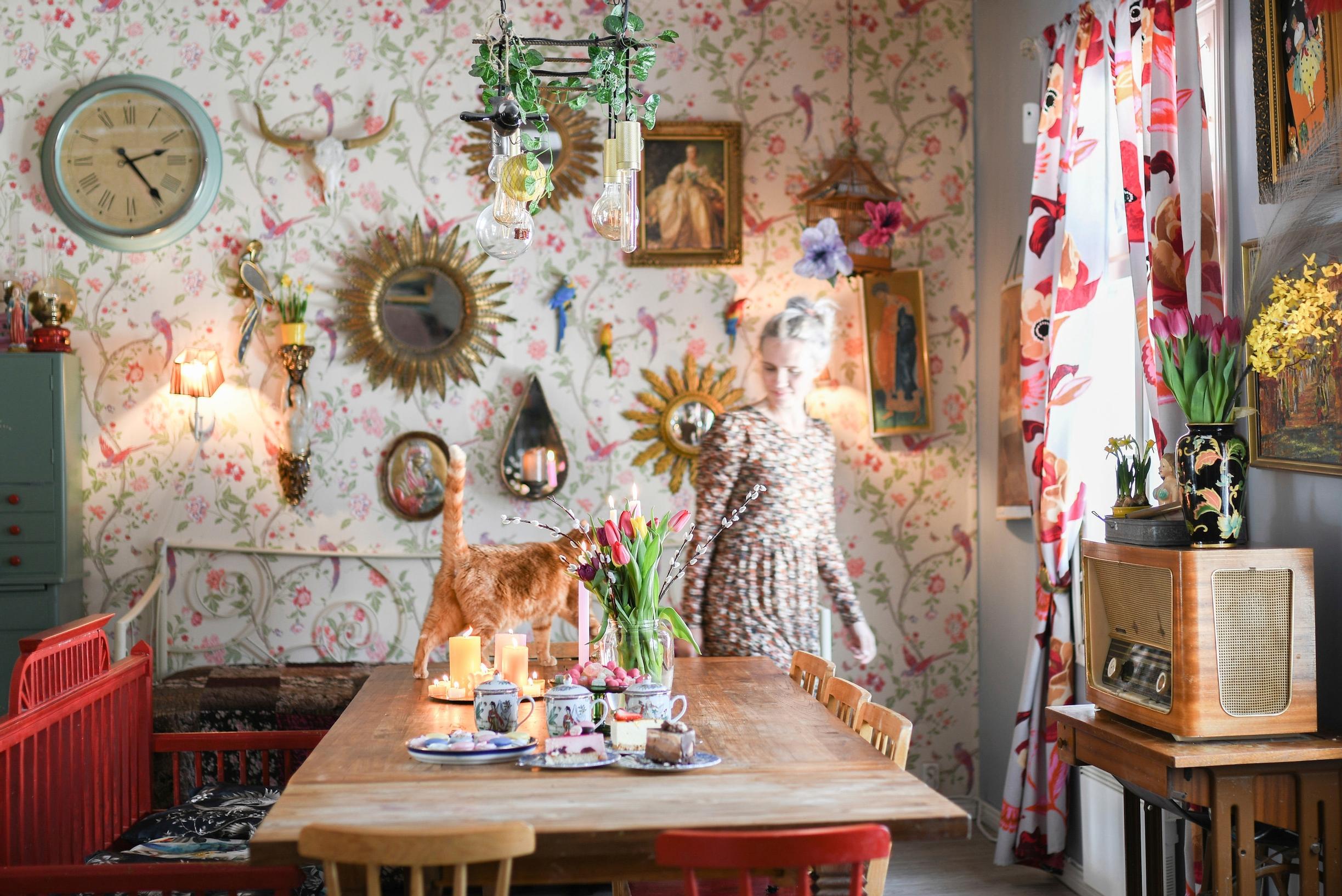 Suvi Kervinen in the colorful dining room.