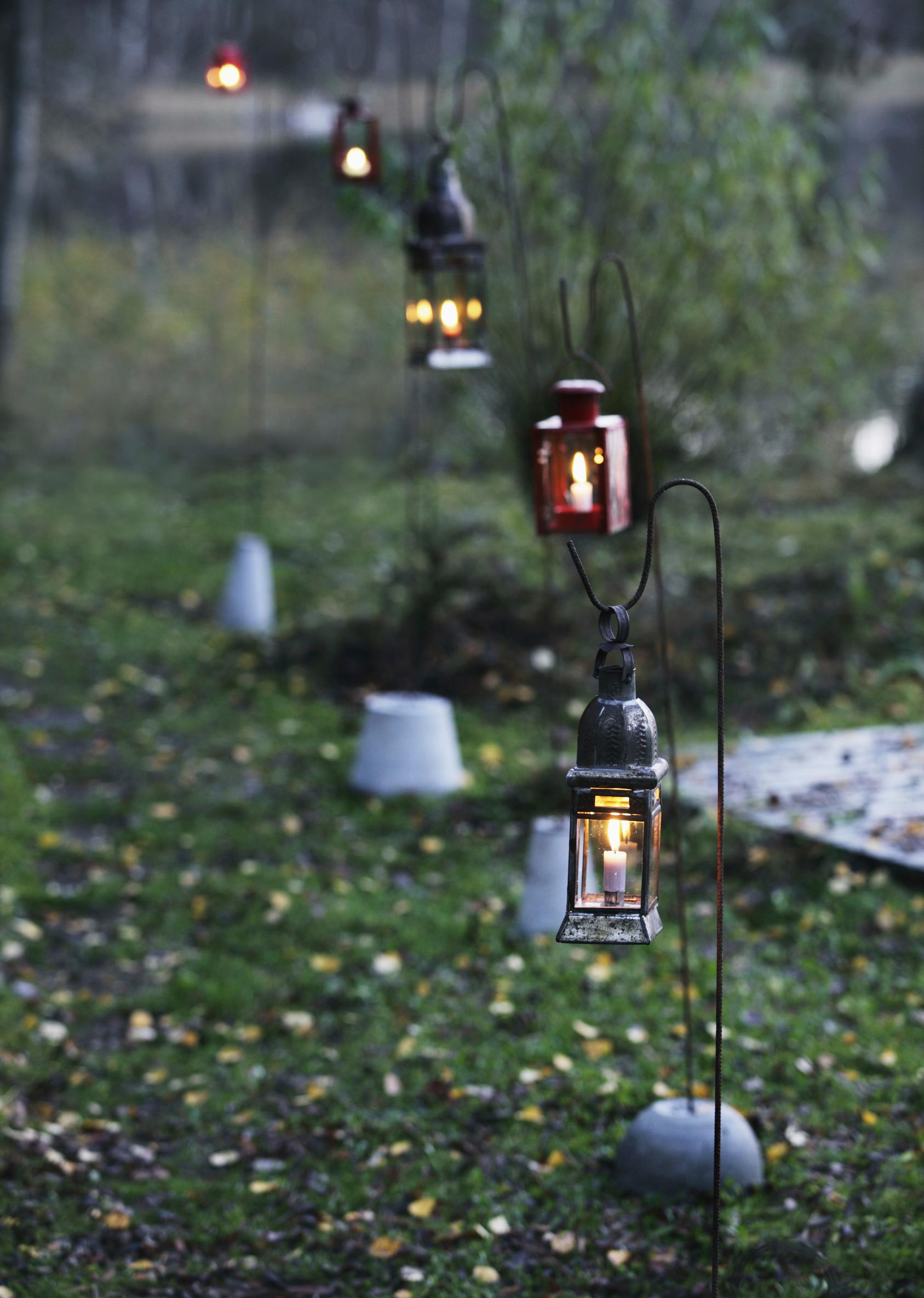 Brighten dark evenings with a sparkling lantern walkway: build a lantern stand that won’t budge in strong winds