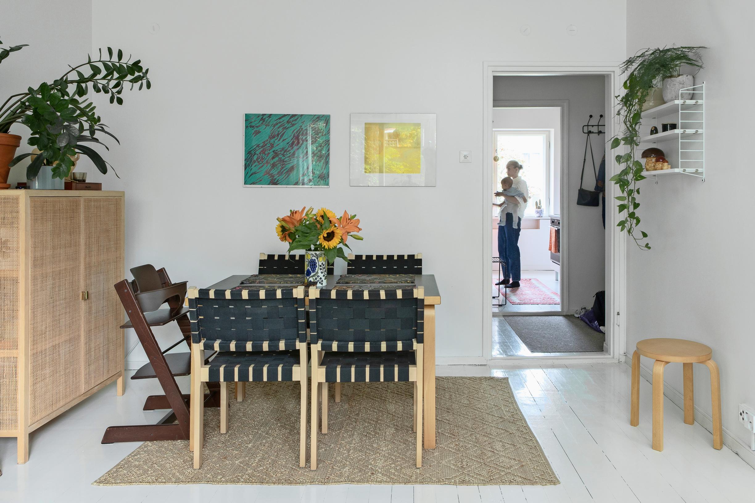 Artek dining set and IKEA’s rattan cabinet