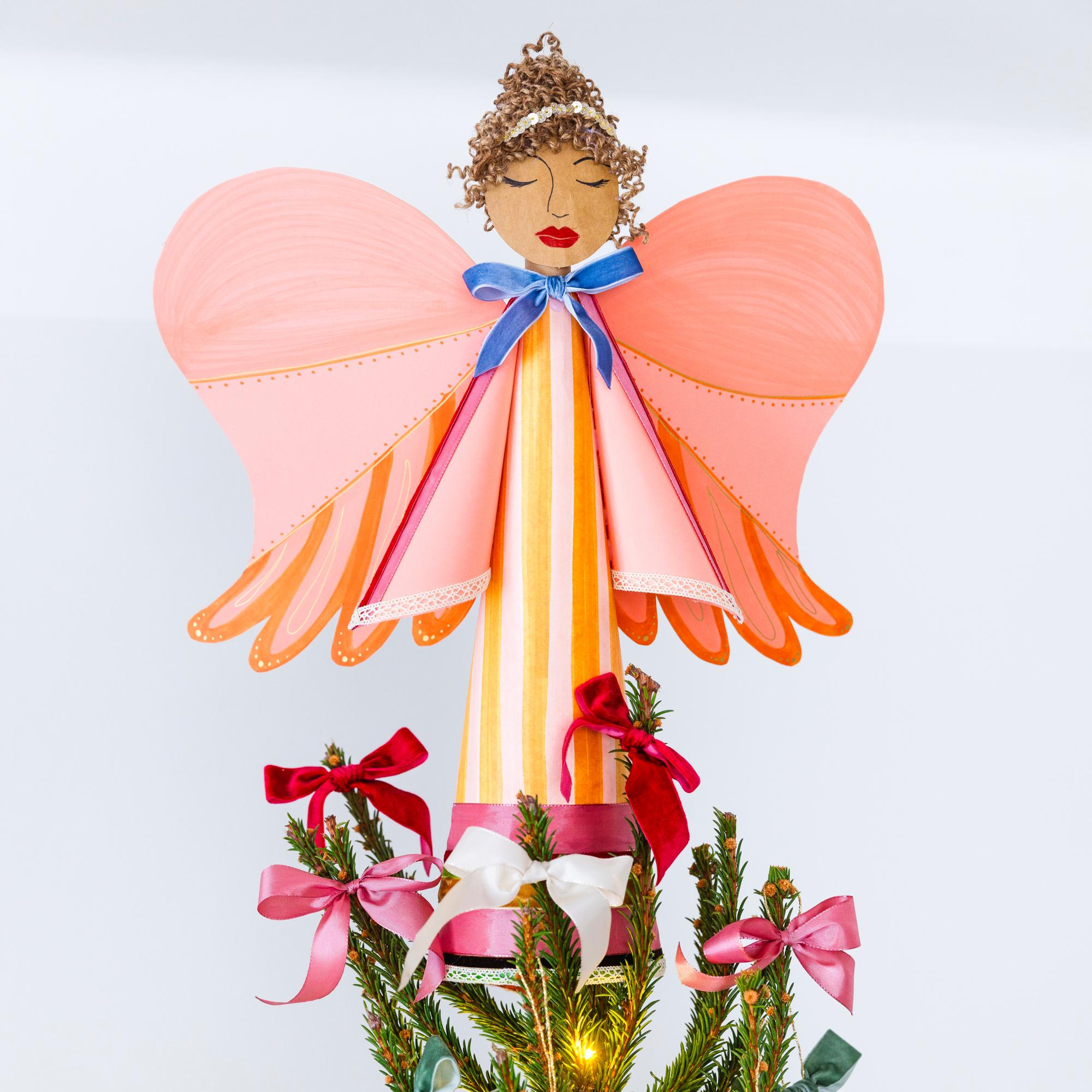 Cute cardboard angel to top your Christmas tree—make from reusable materials!
