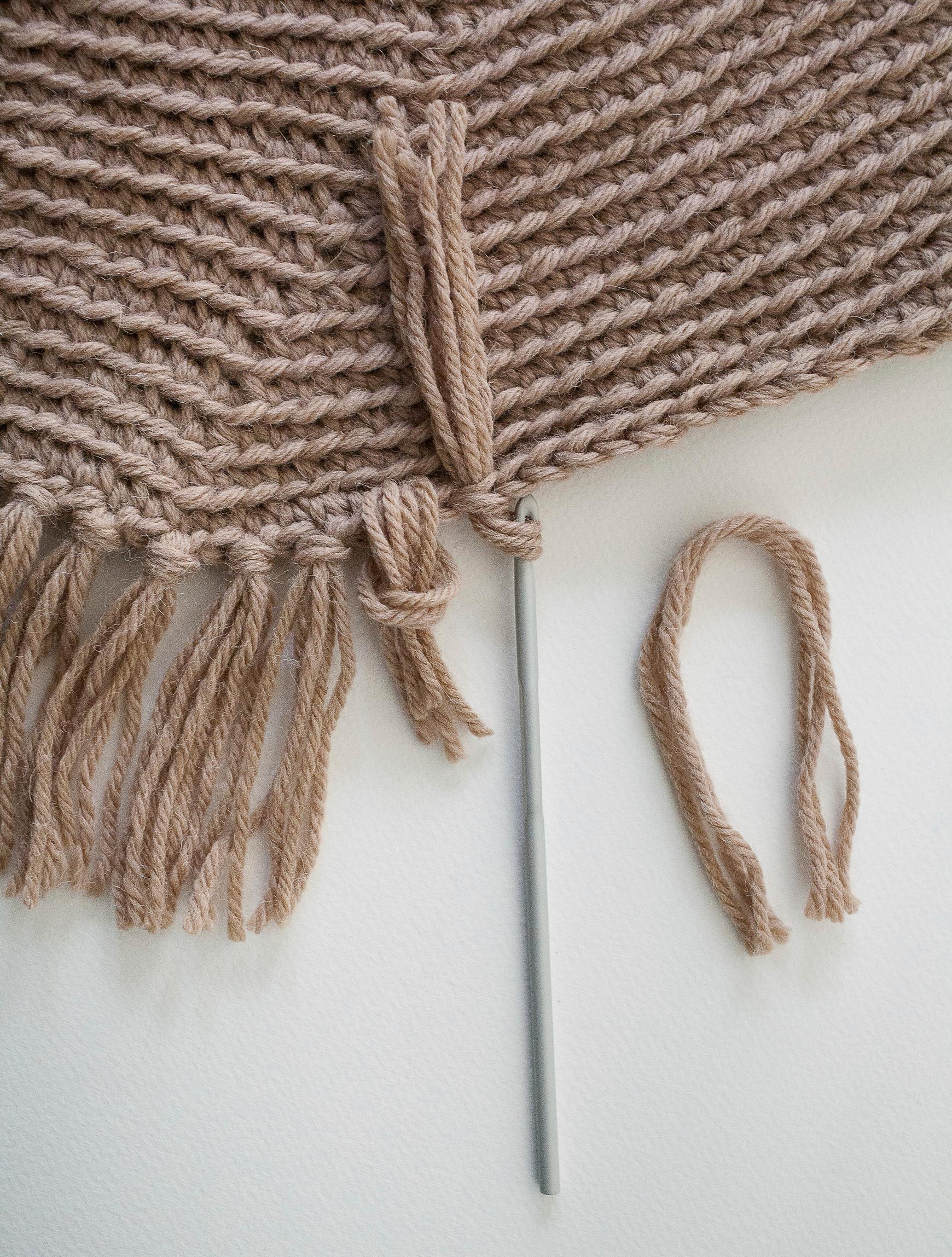 Crocheted fringe rug fringes