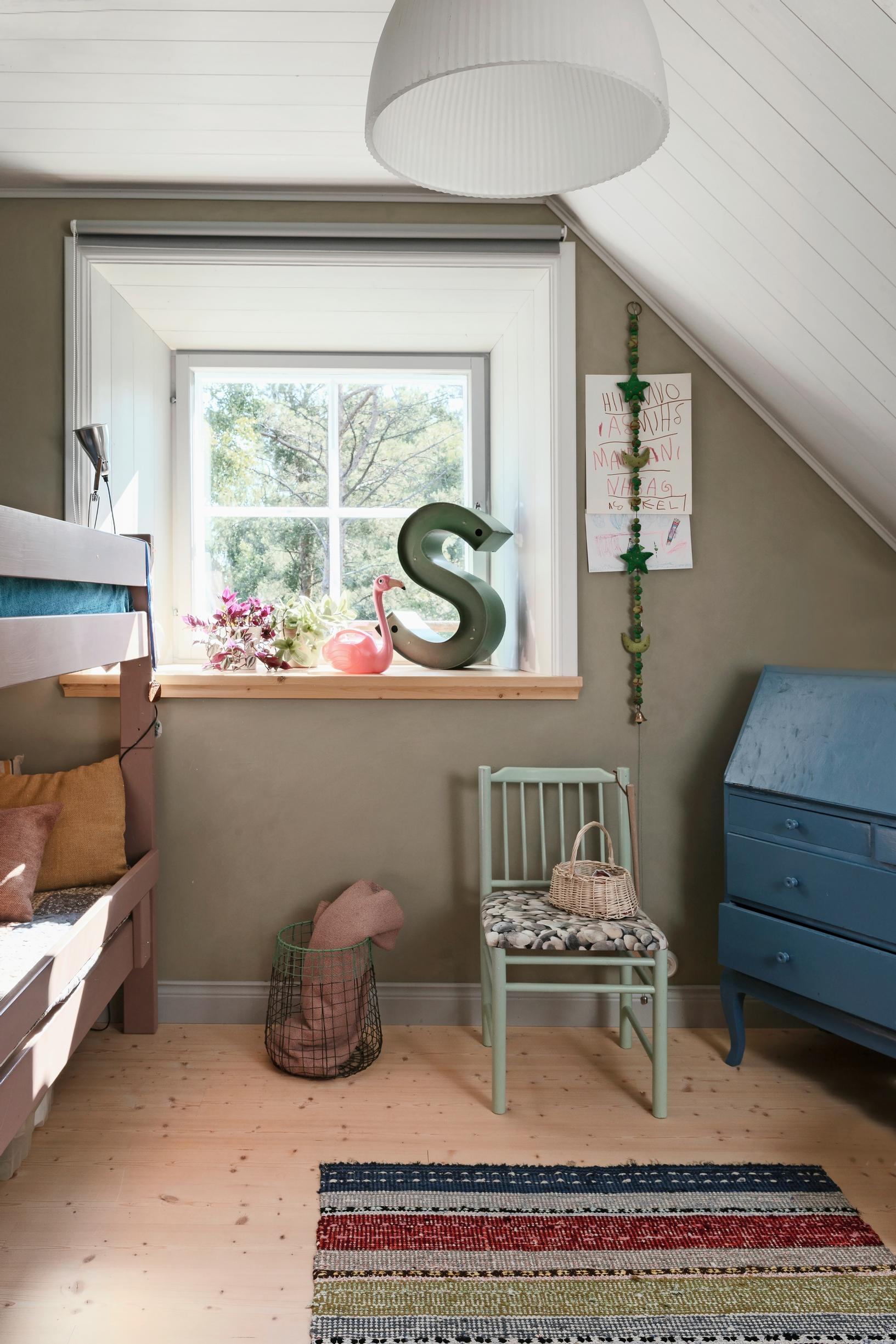 A children’s room with a deep windowsill