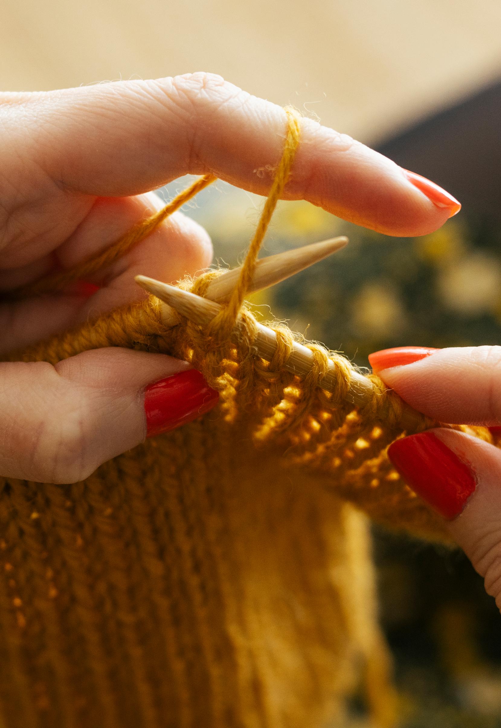 How to knit ribbing: Inserting the needle through the back loop