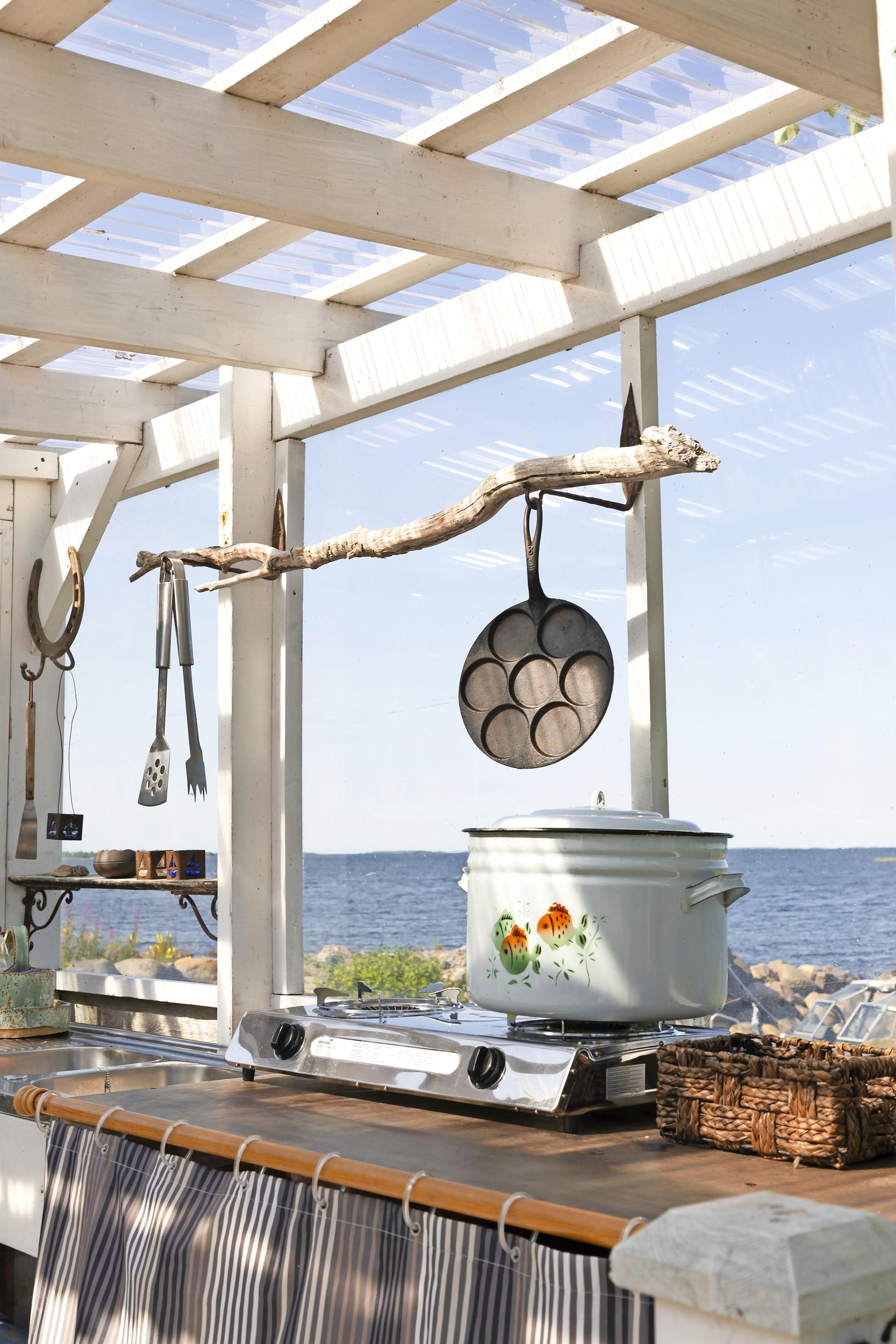 Marita and Eki’s summer kitchen at their island cottage with a sea view