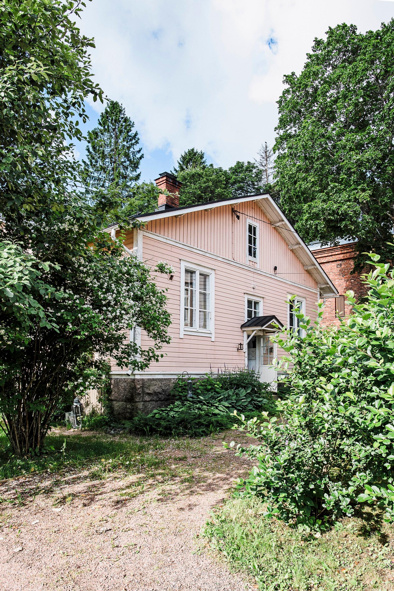 From teardown to treasure: how a pink wooden villa stole their hearts