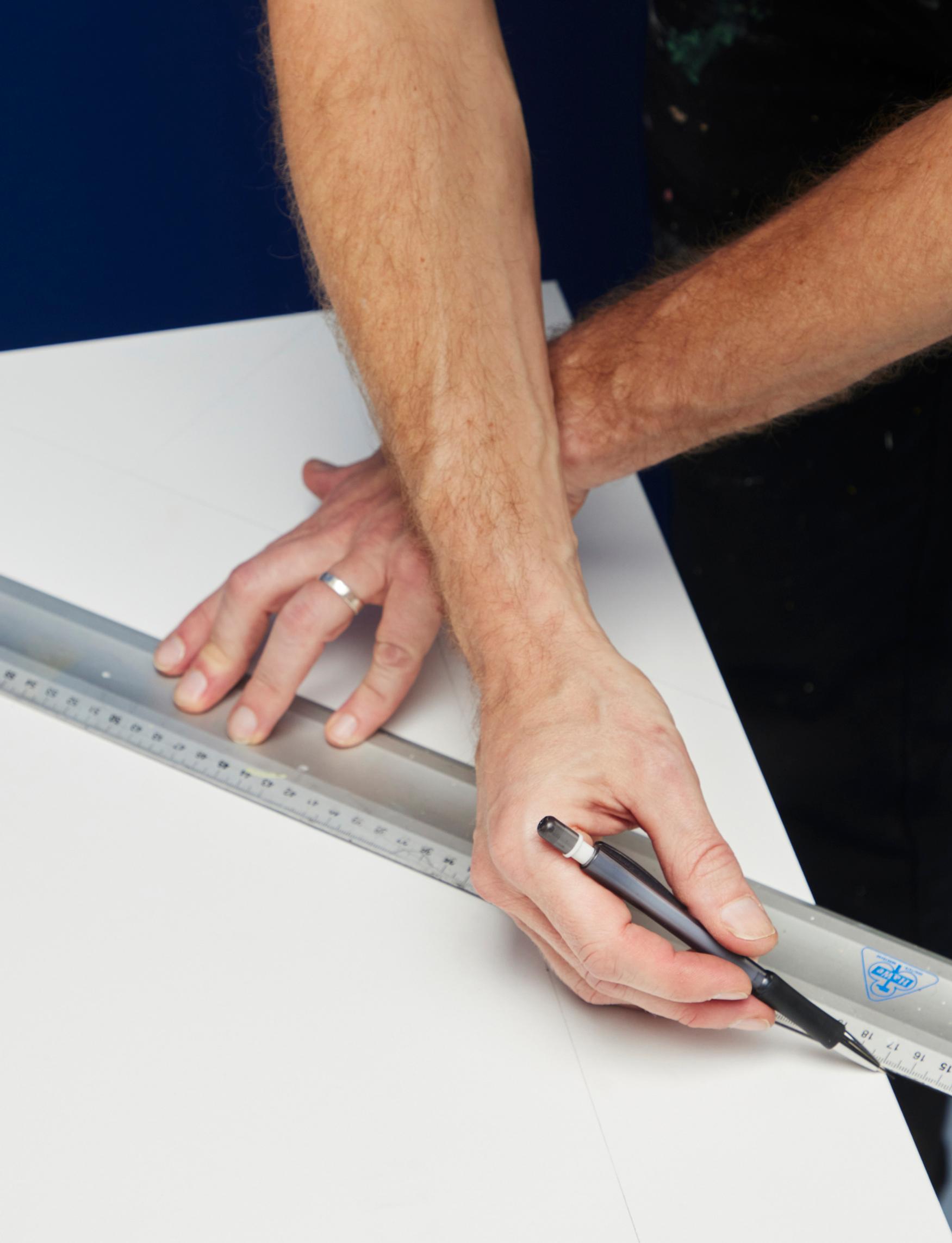 Measure and decide on a square size that suits your surface.