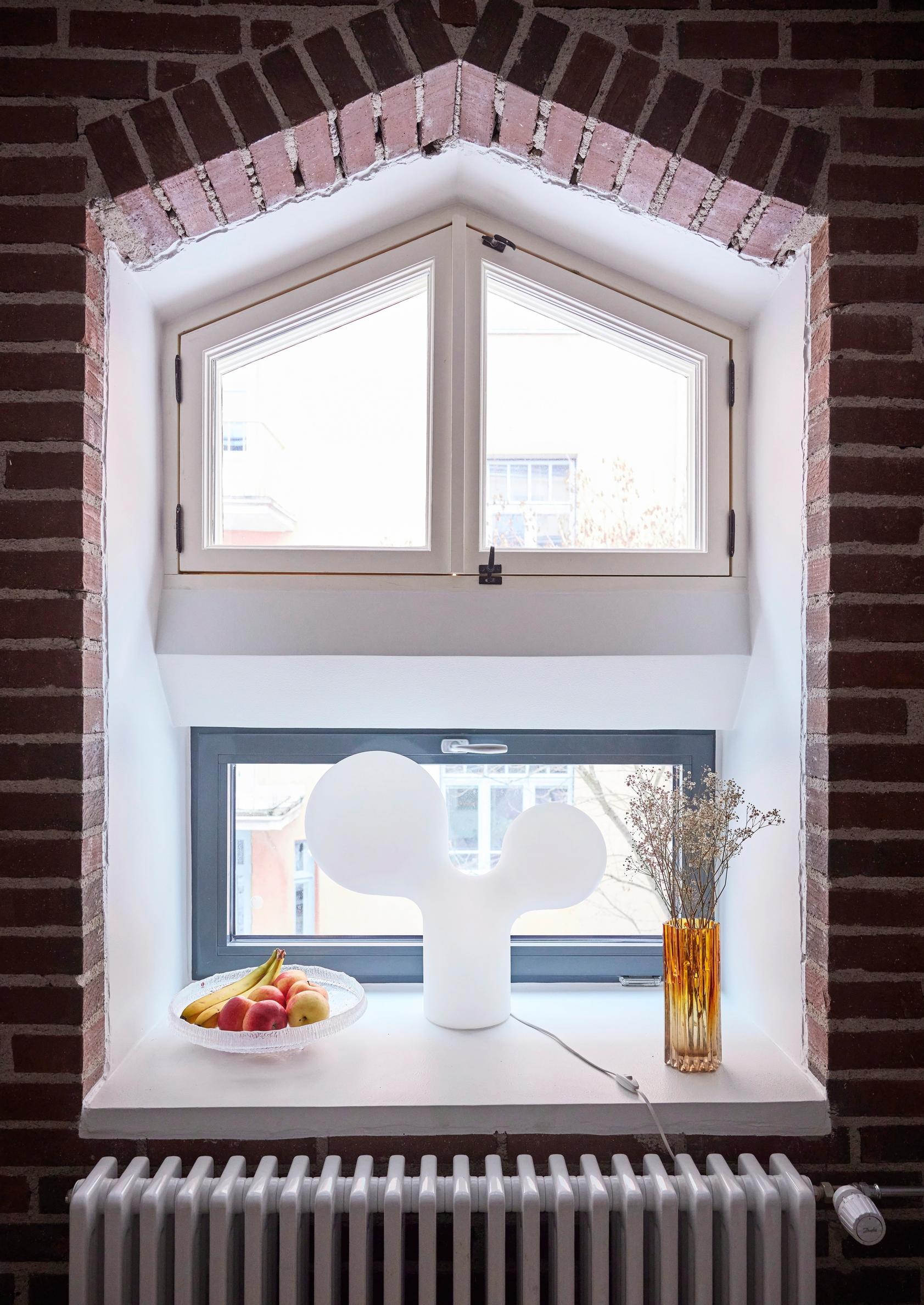 Window in an apartment renovated from an old horse stable