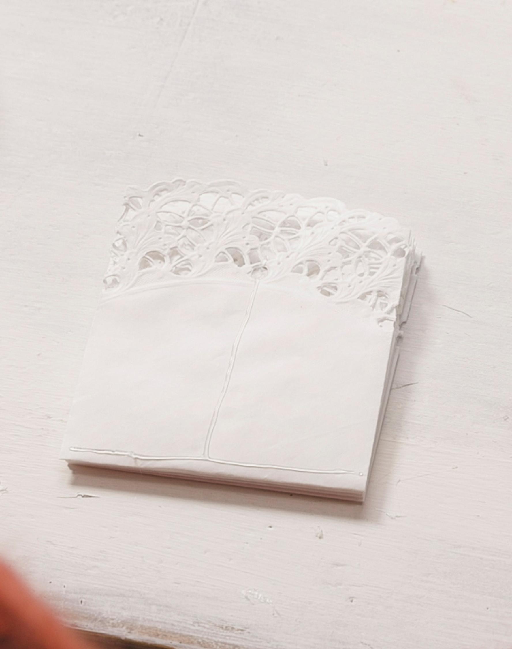 Stacking and gluing the paper doilies