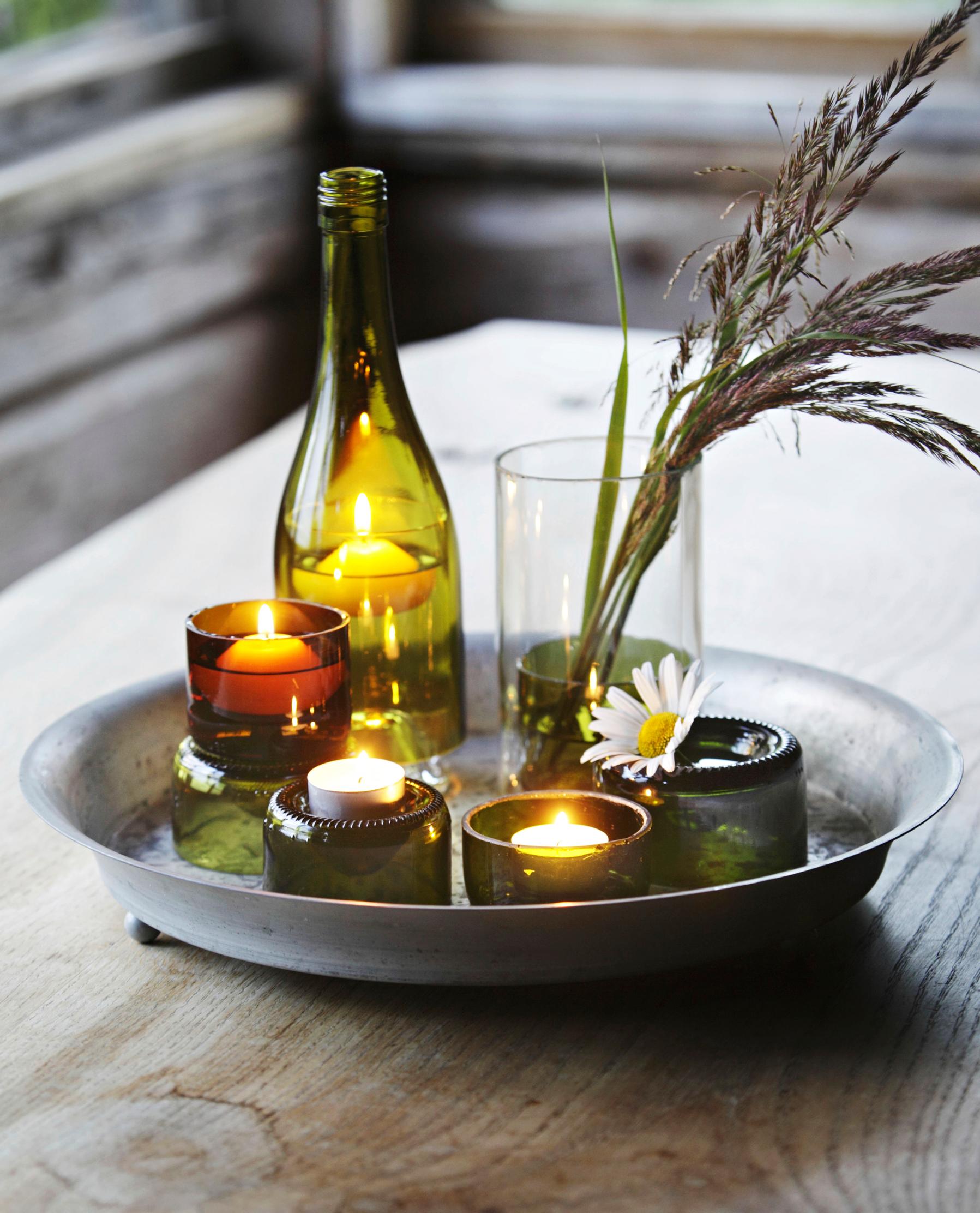 A glass bottle turned into a candle lantern