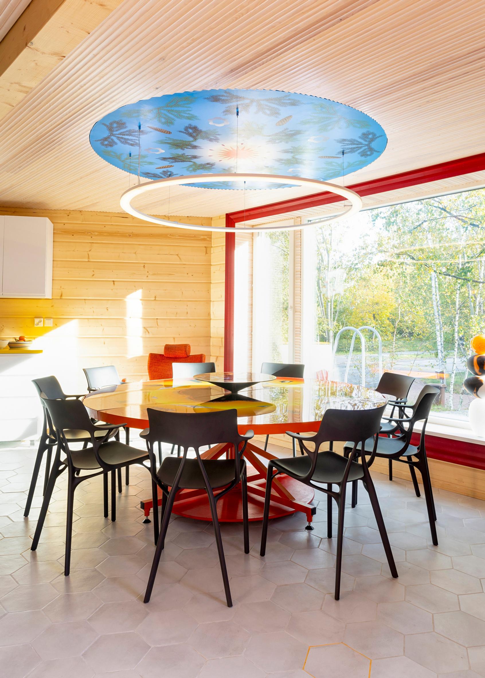 Jan-Erik Andersson’s sky-themed piece above the dining table