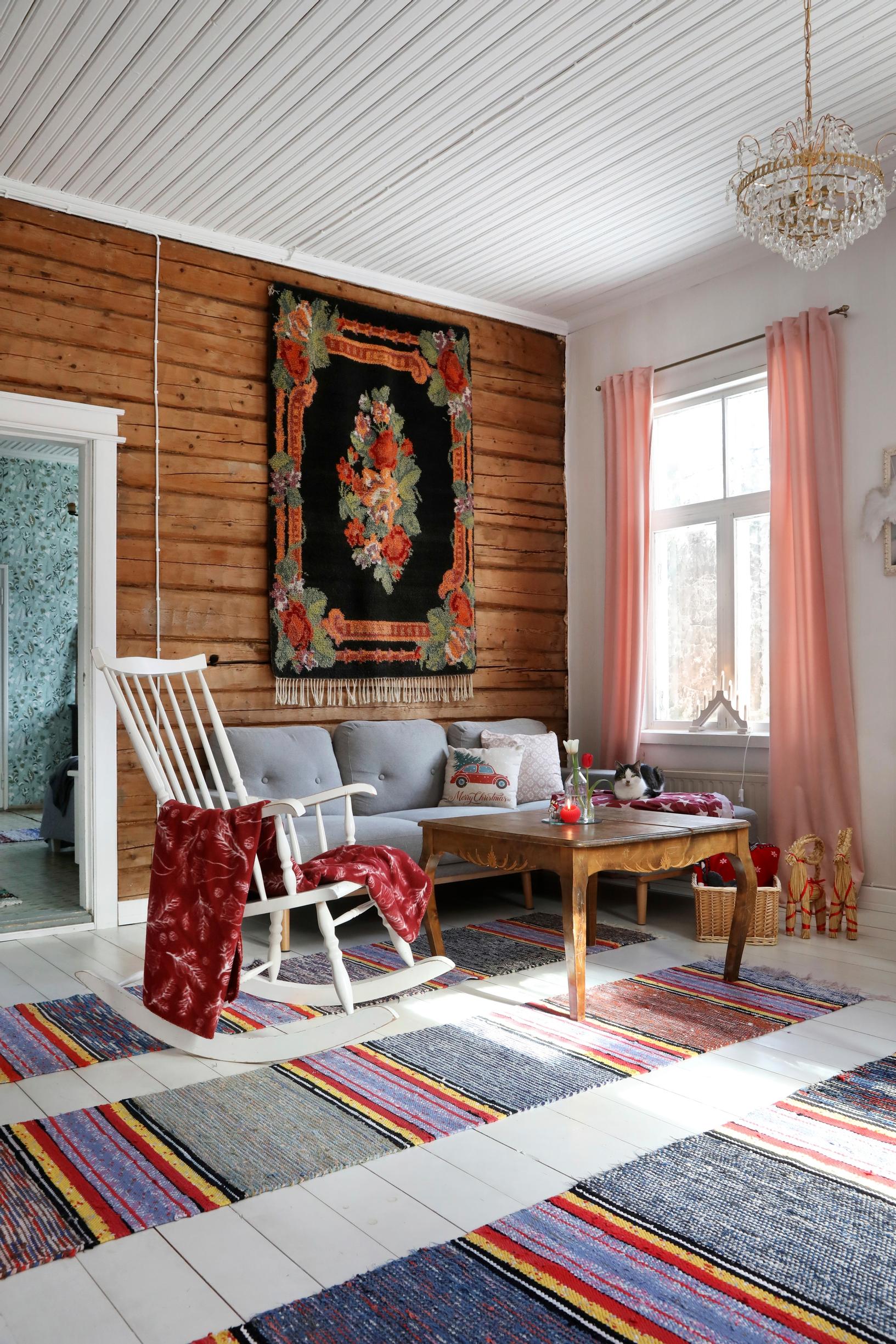 Long rag rugs on the living room floor