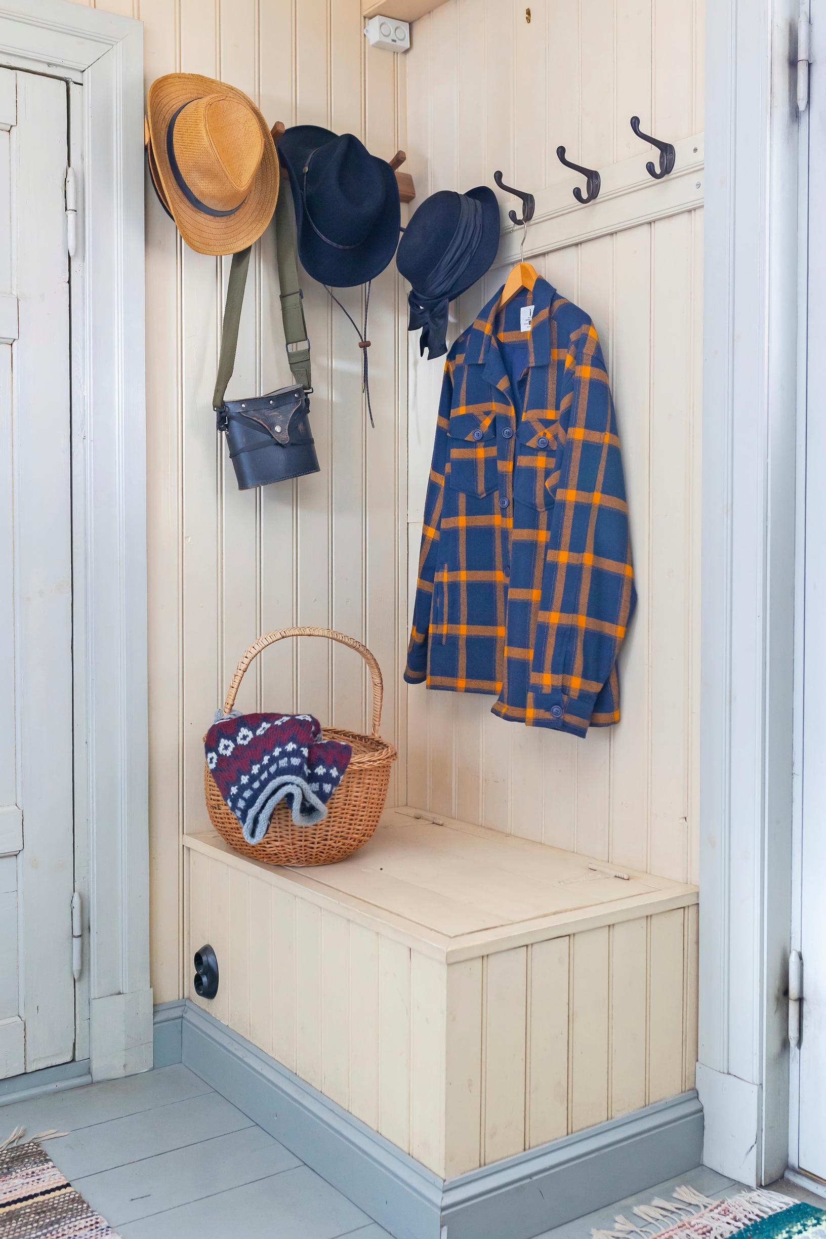 A coat rack built into a corner.