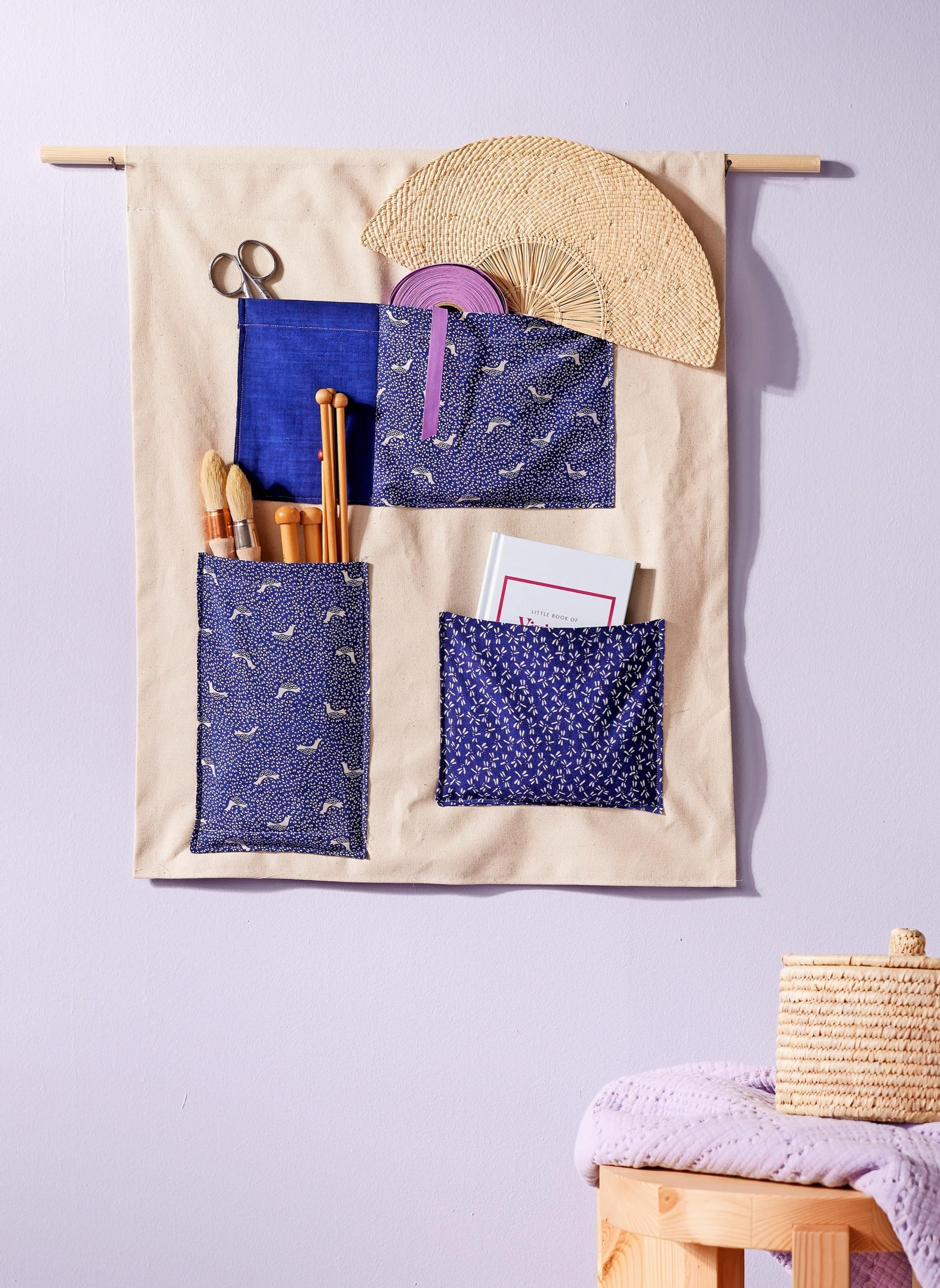 Fabric wall organizer with pockets