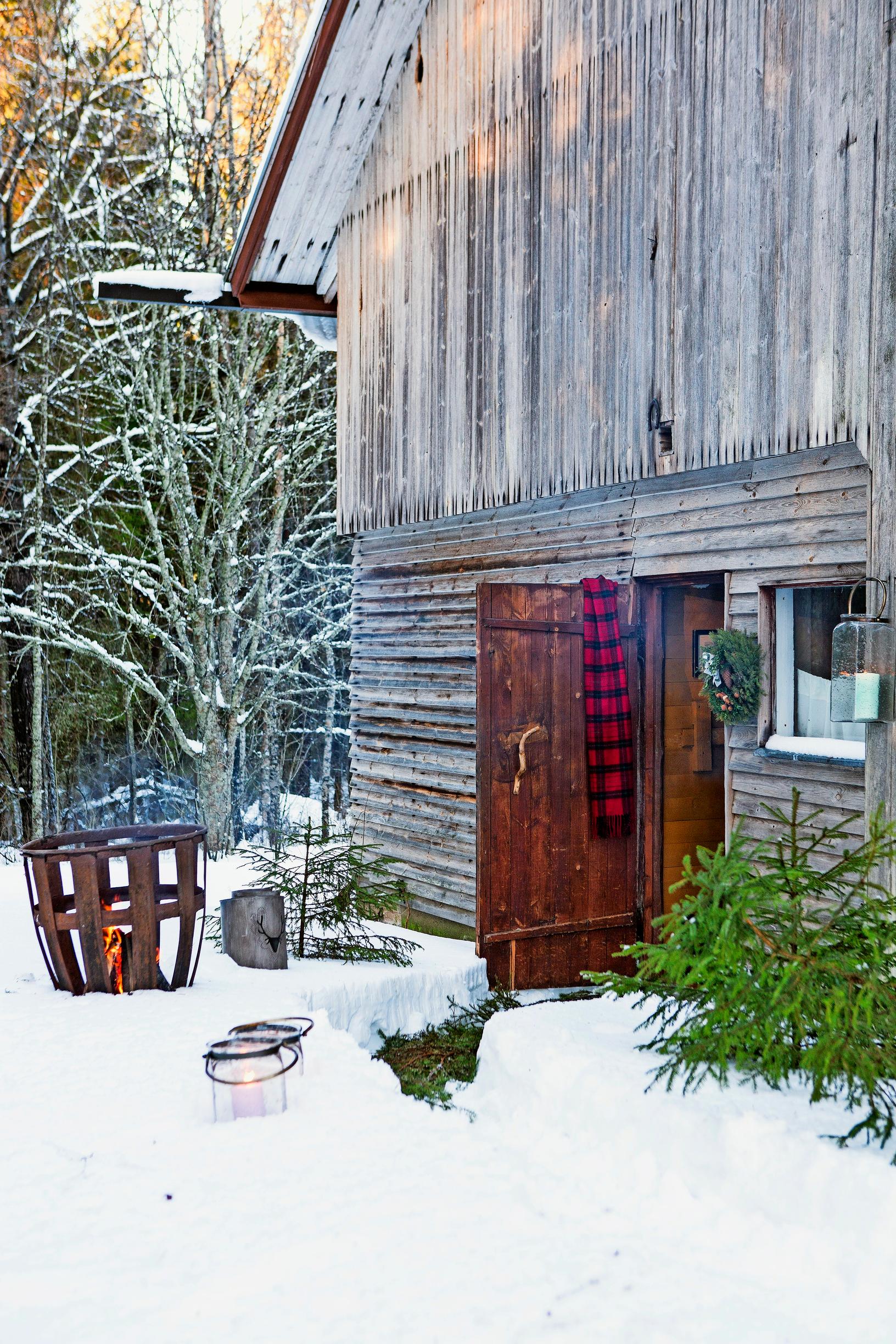 Unique saunas: Snow-covered entrance to a sauna converted from an old barn’s horse stable
