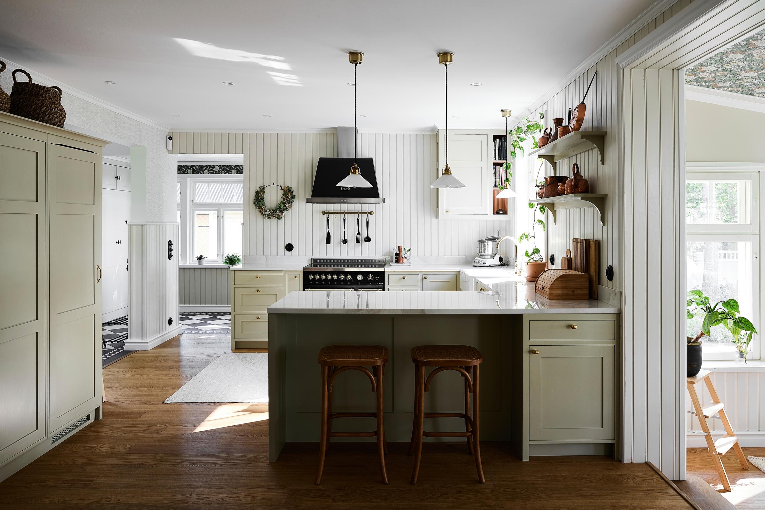 Range hood and gas stove in the solid wood kitchen