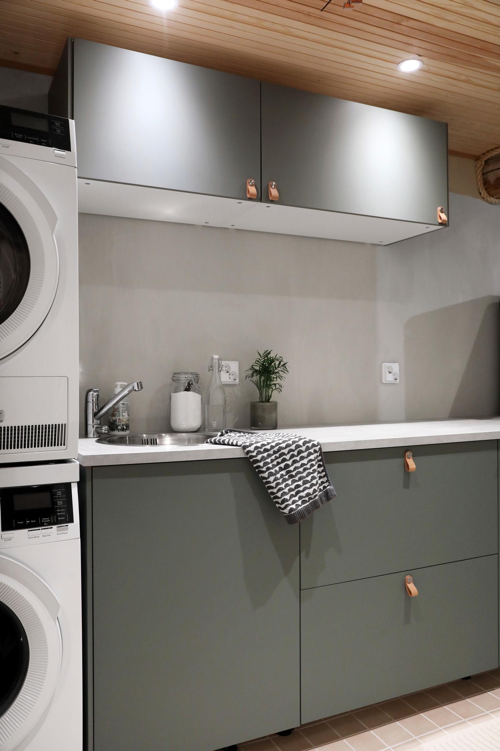 Laundry room with a washer-dryer stack