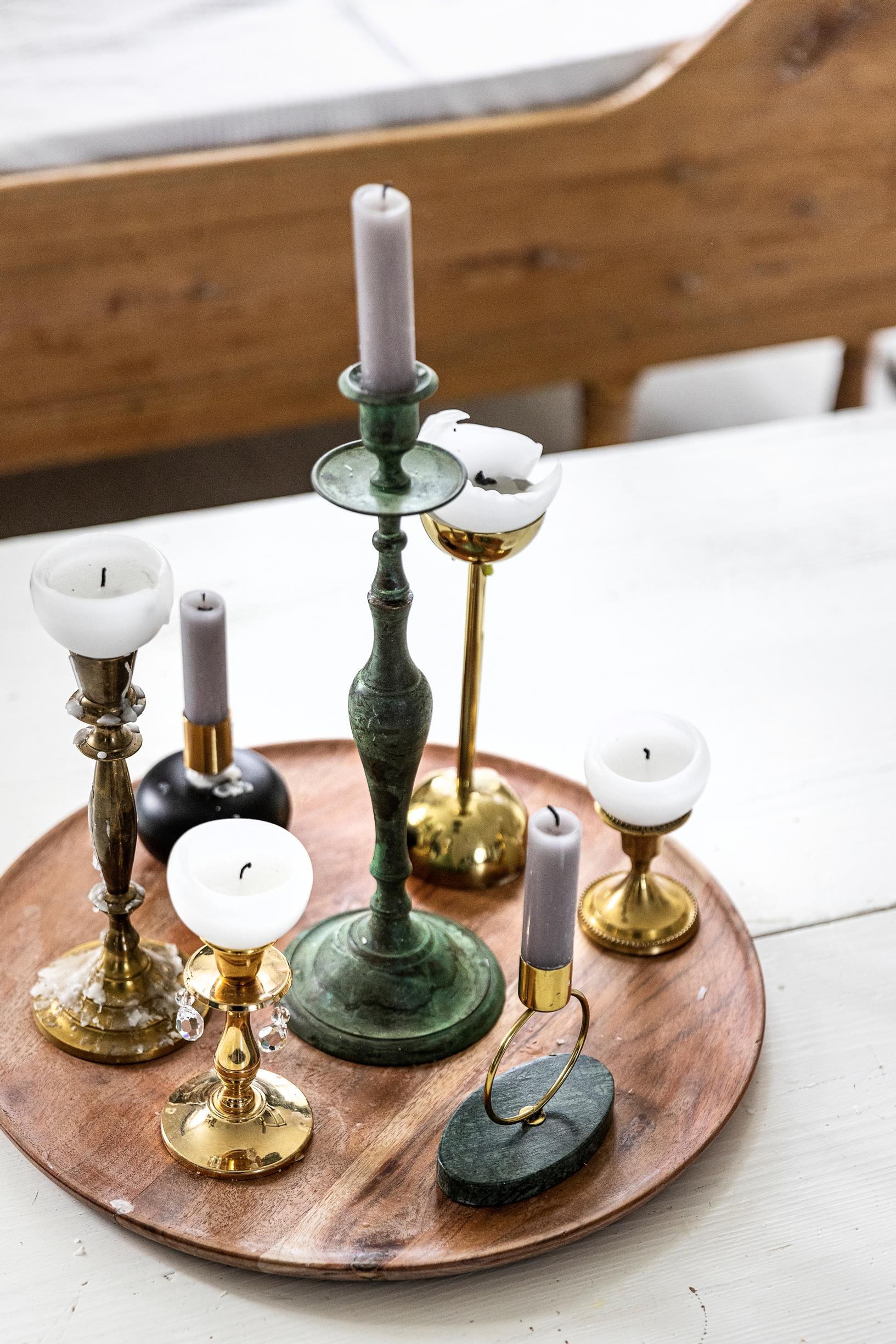 A candle arrangement on a tray