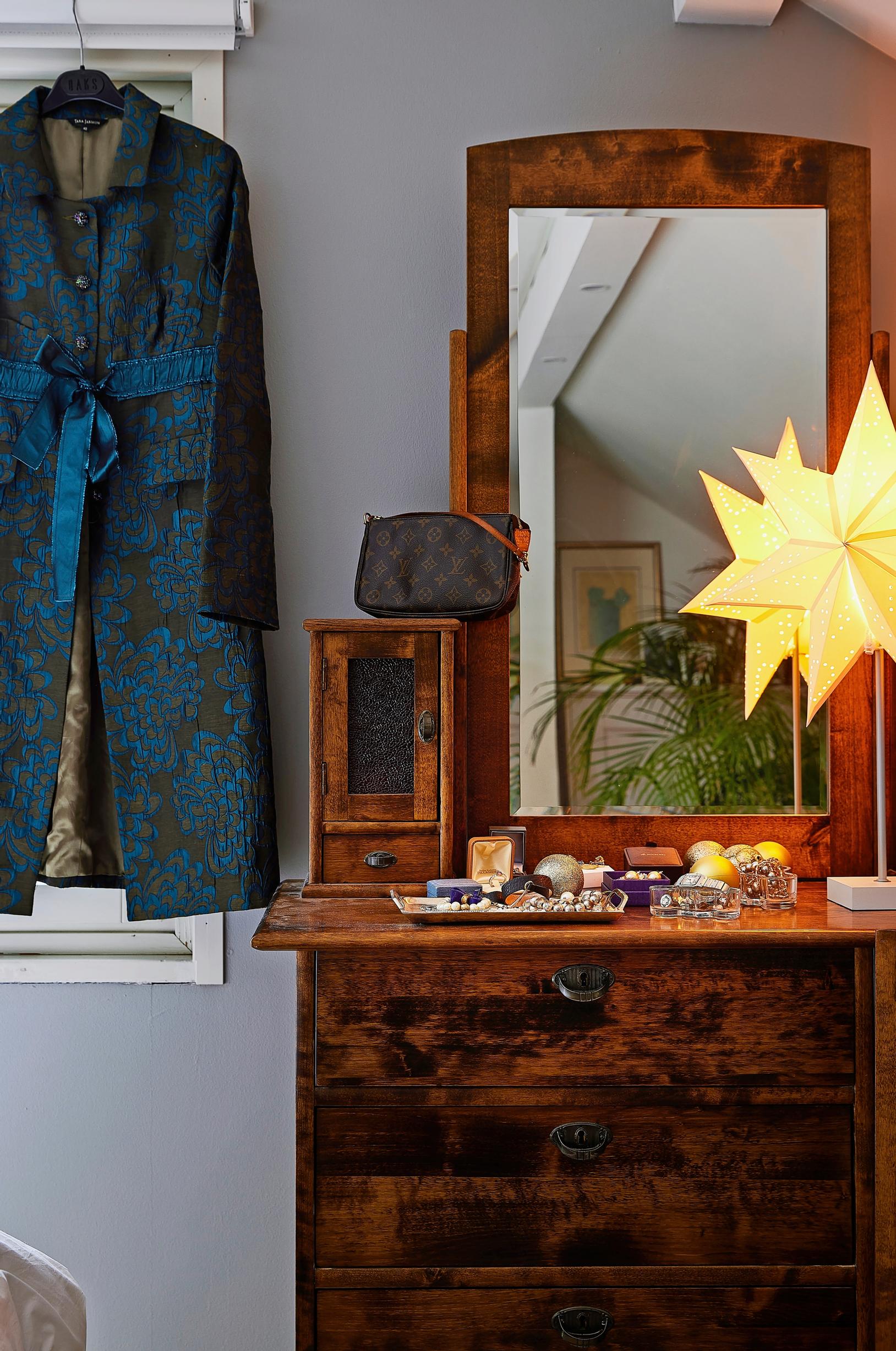 Mirrored dresser in the bedroom