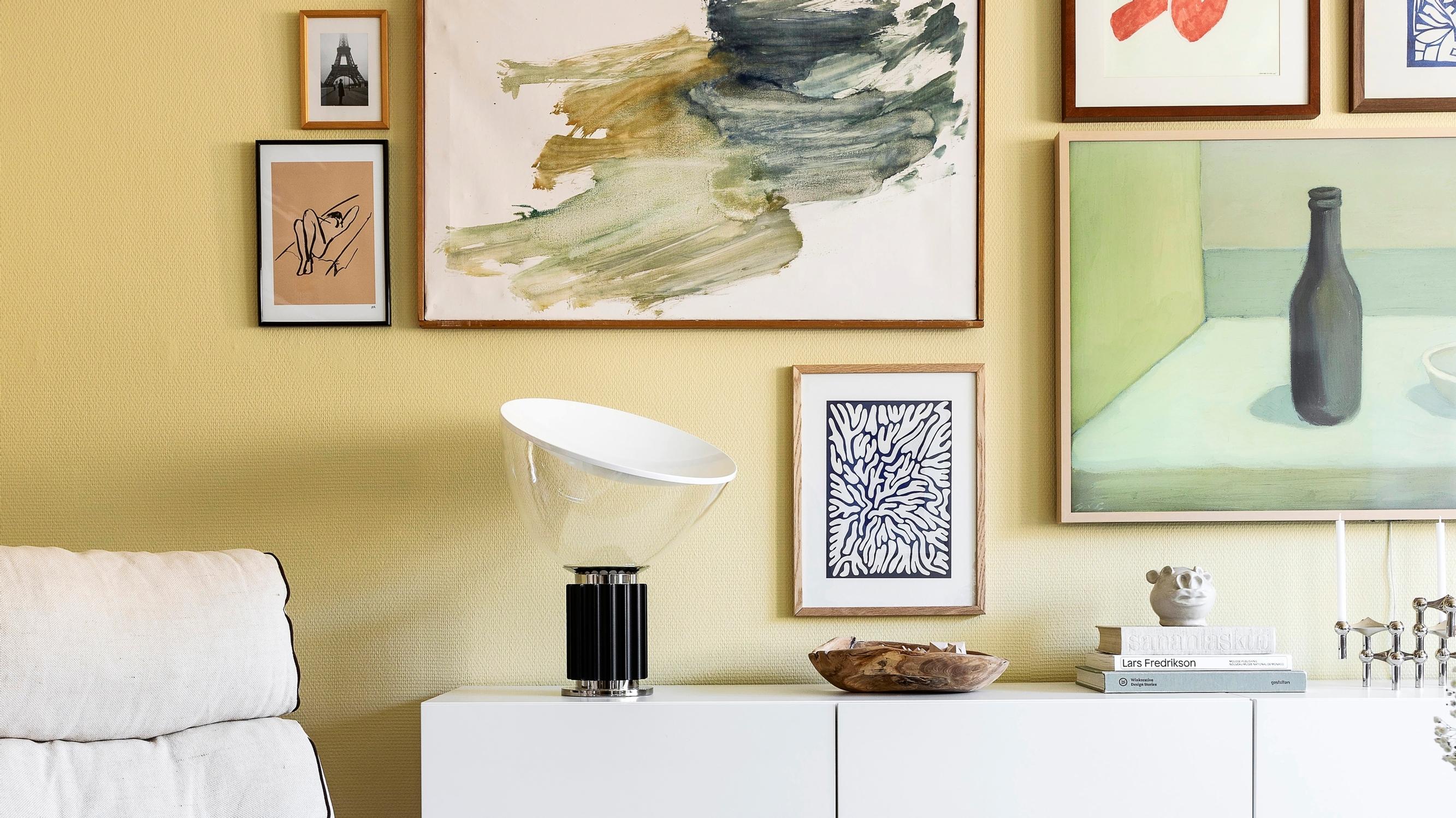 What on earth is “gallery height”? An interior designer explains how high to hang your art—read these tips!