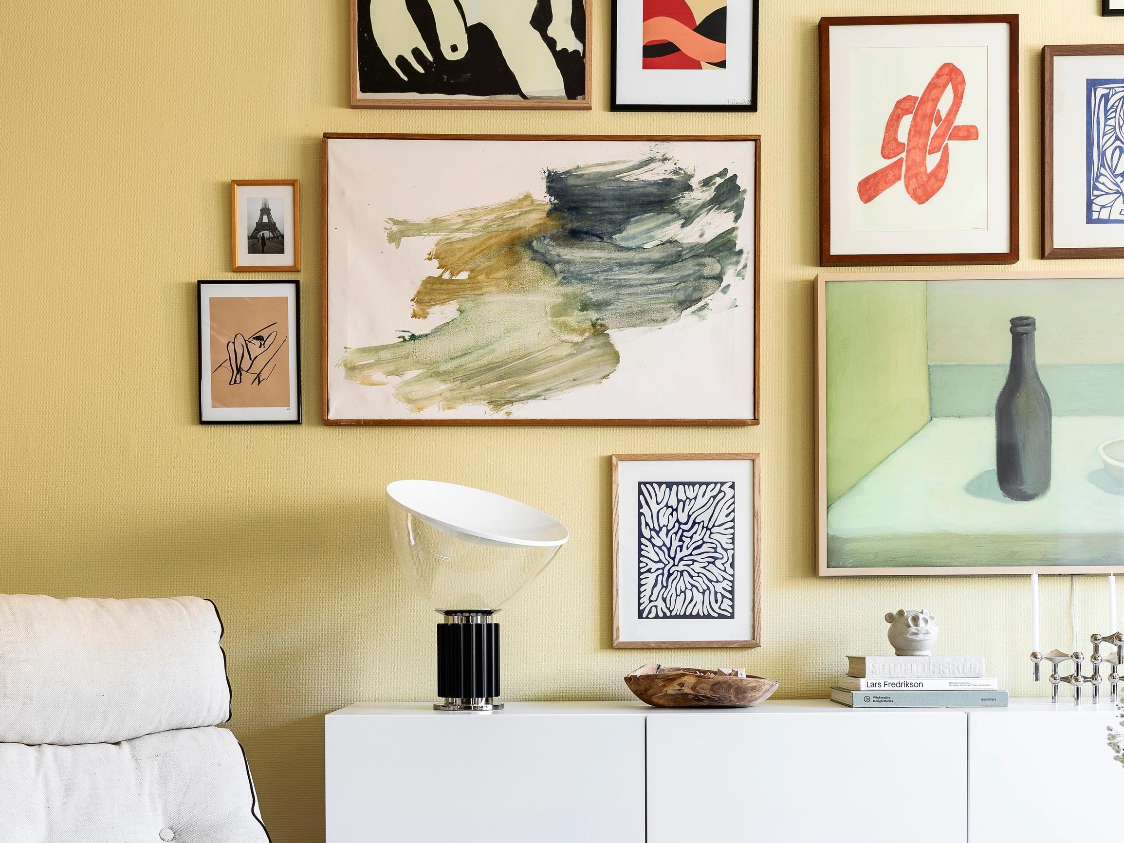 What on earth is “gallery height”? An interior designer explains how high to hang your art—read these tips!